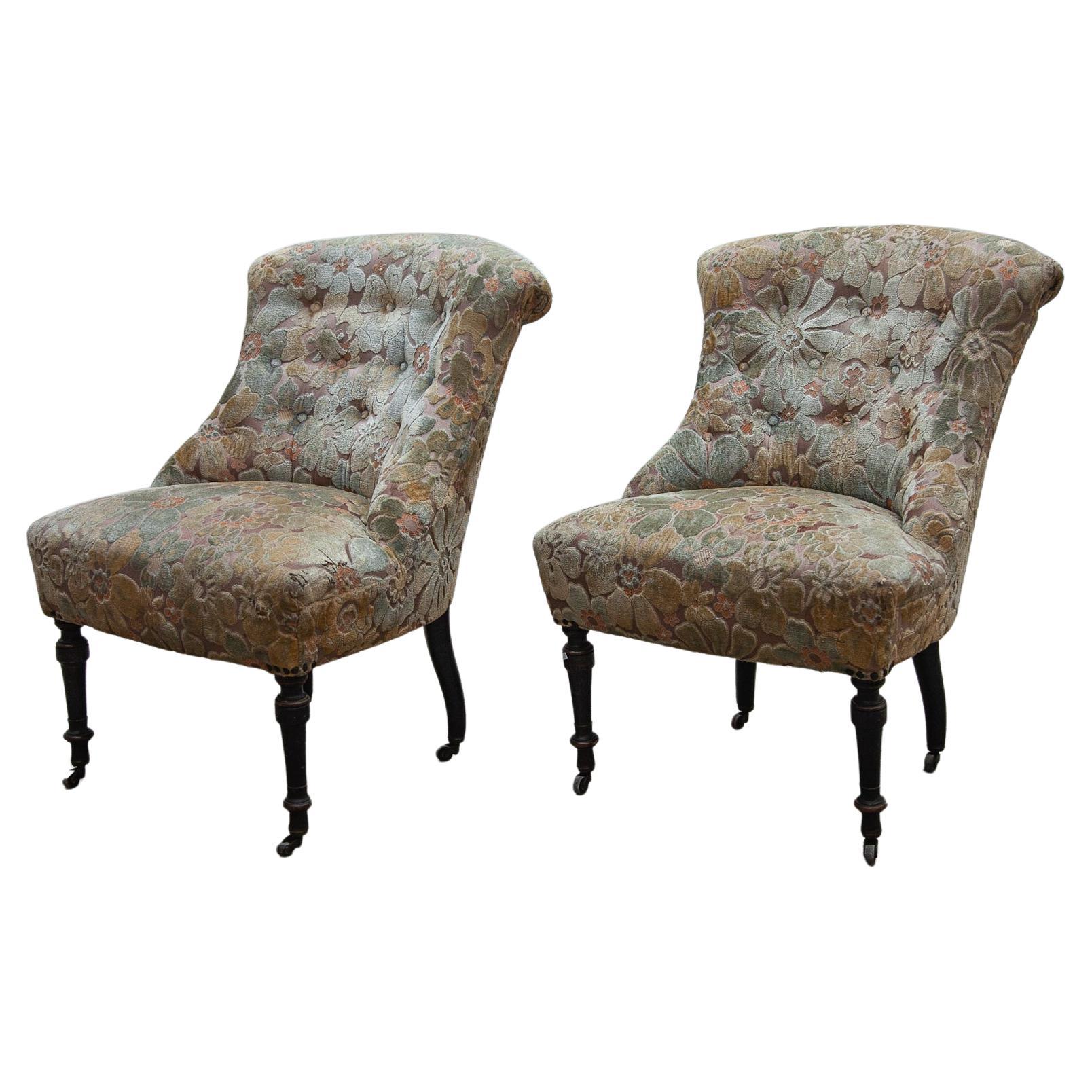 Pair of French Victorian club lounge chairs 19th century in good condition in velvet flower upholstery a perfect antique set for your interior modern or cottage style. Period in English furniture during the reign of Queen Victoria 1837-1901.