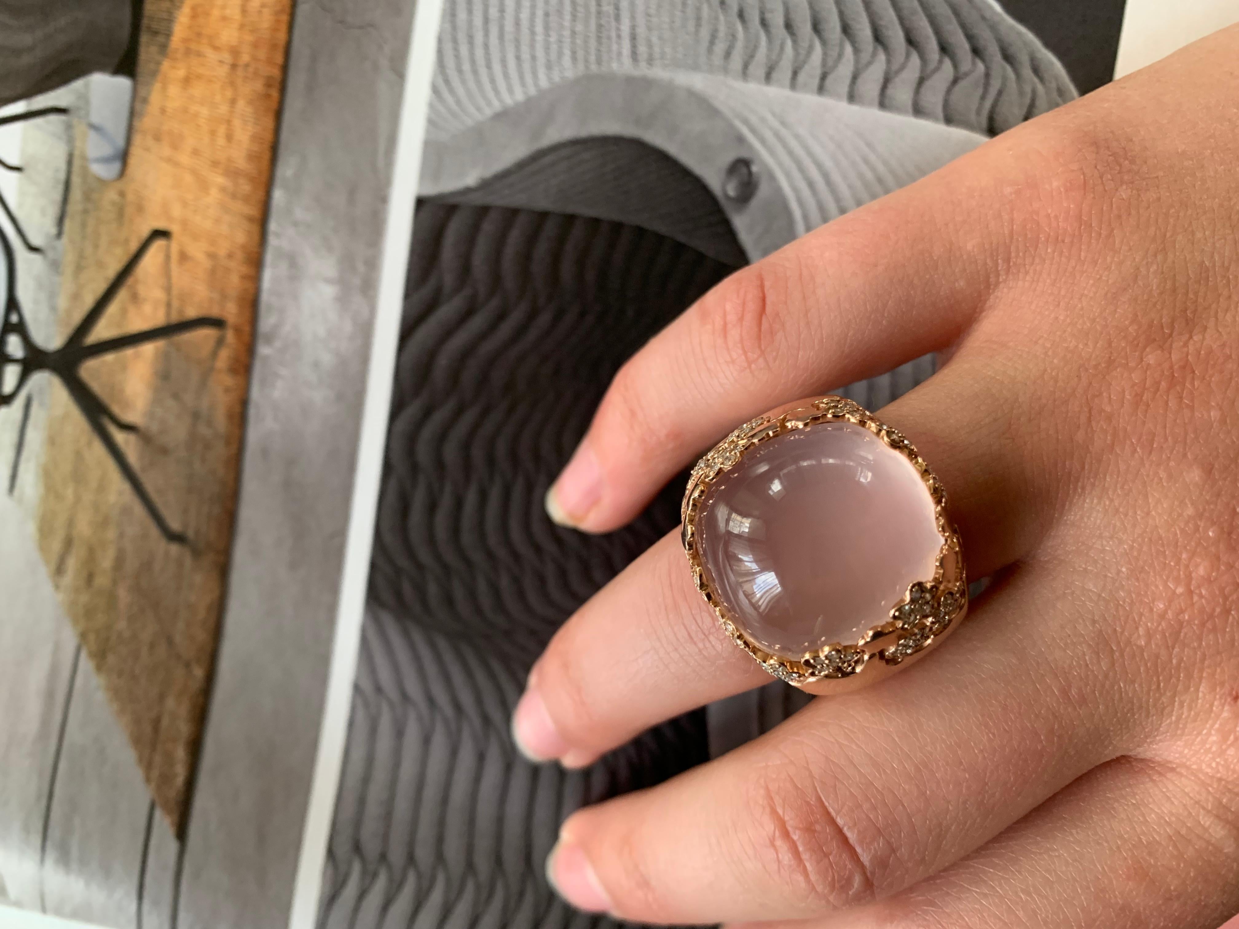 Spectacular 30 carat fine translucent pink Rose Quartz and diamond rose gold Cocktail ring.
Composed of three elements symbolizing Romance- Rose Quartz, Rose Gold and Diamond Rose Flowers.
Superb quality substantial setting with diamond set and