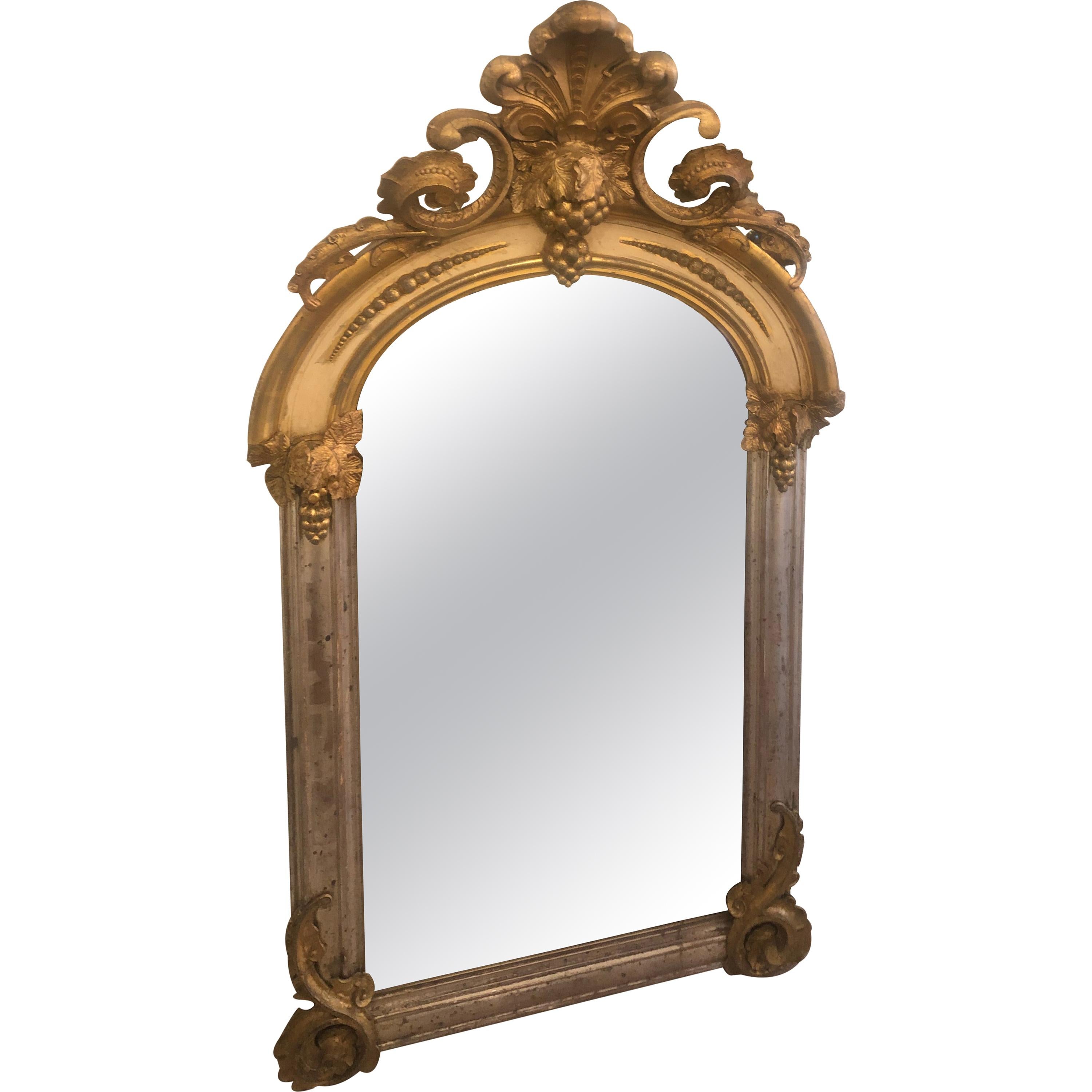 Romantic and Rare Belle Époque Parcel-Gilt and Lemon Silver Arched Wall Mirror