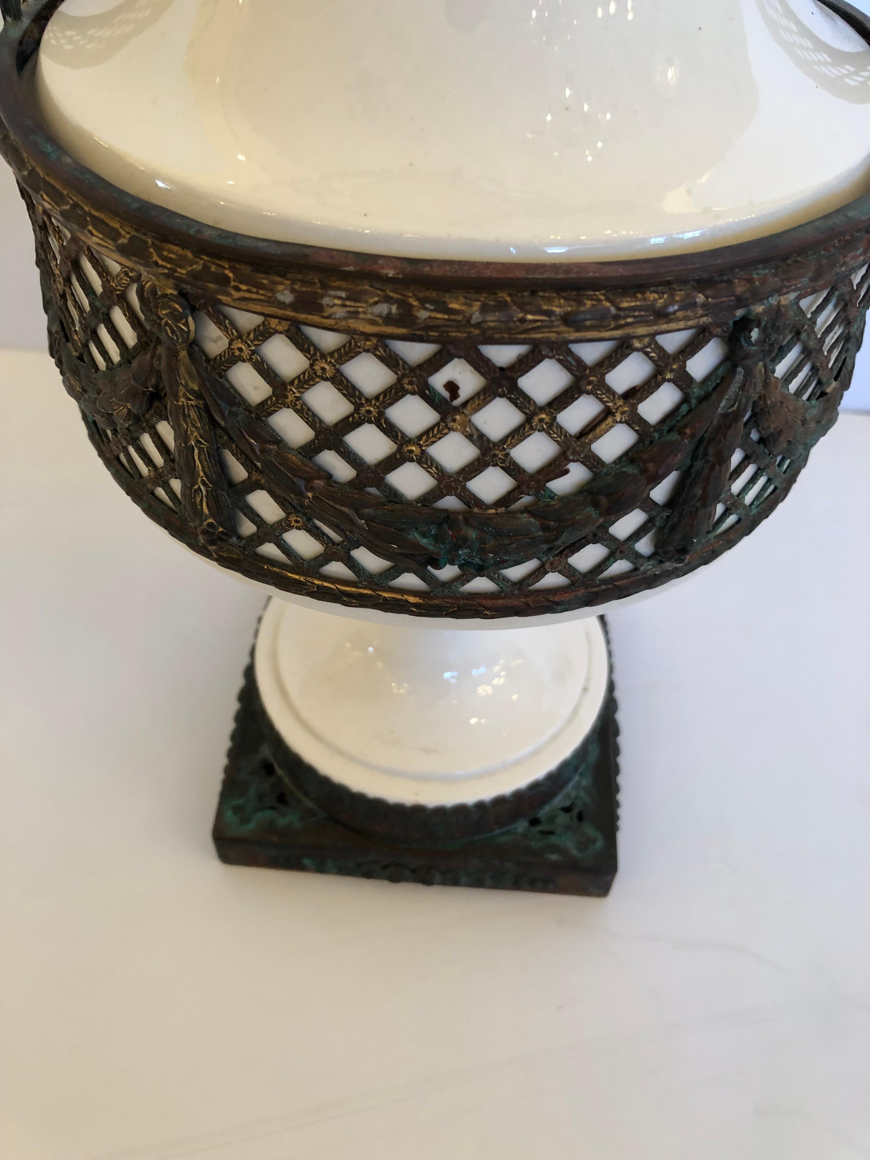 Neoclassical Romantic Antique French White Porcelain Vase with Aged Copper Overlay For Sale