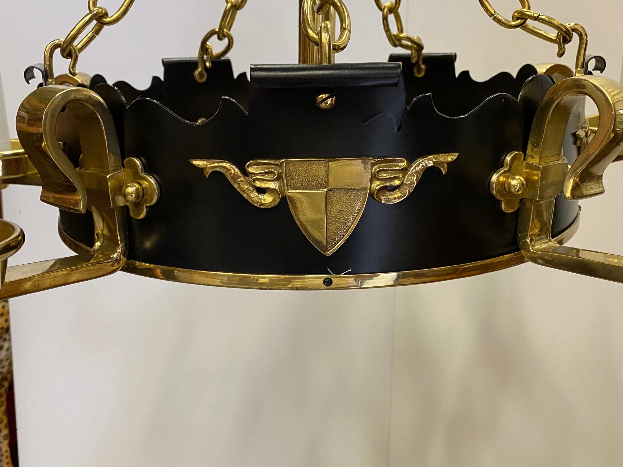 black and antique brass chandelier