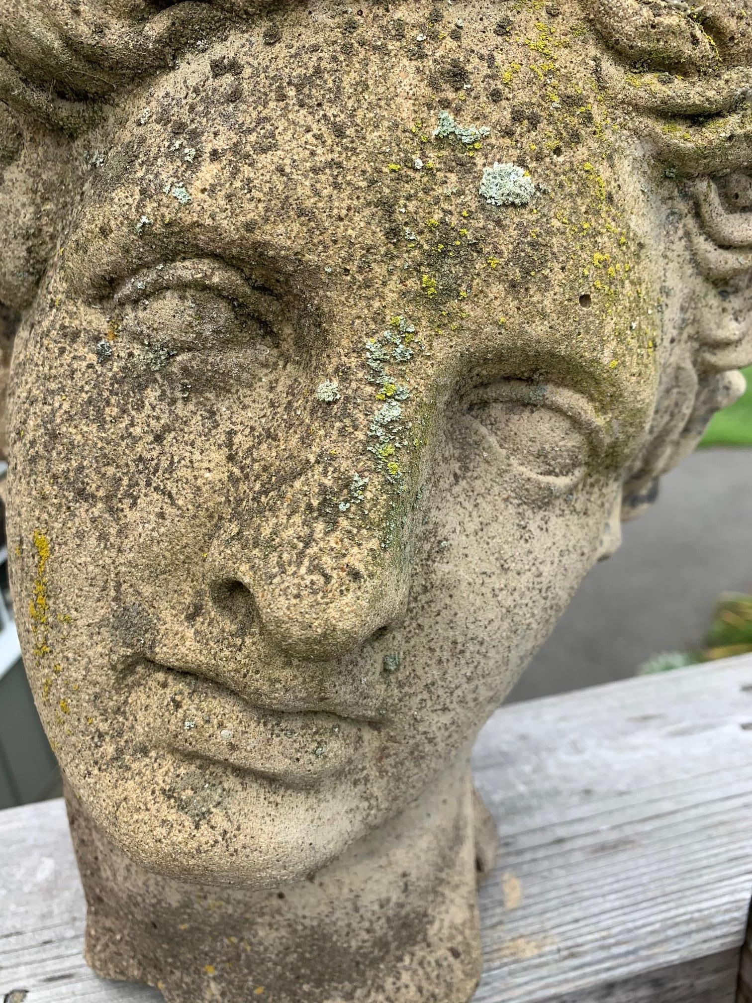 A beautiful antique classical cement head sculpture, probably of Diana. Can be displayed indoors or in the garden.


  
