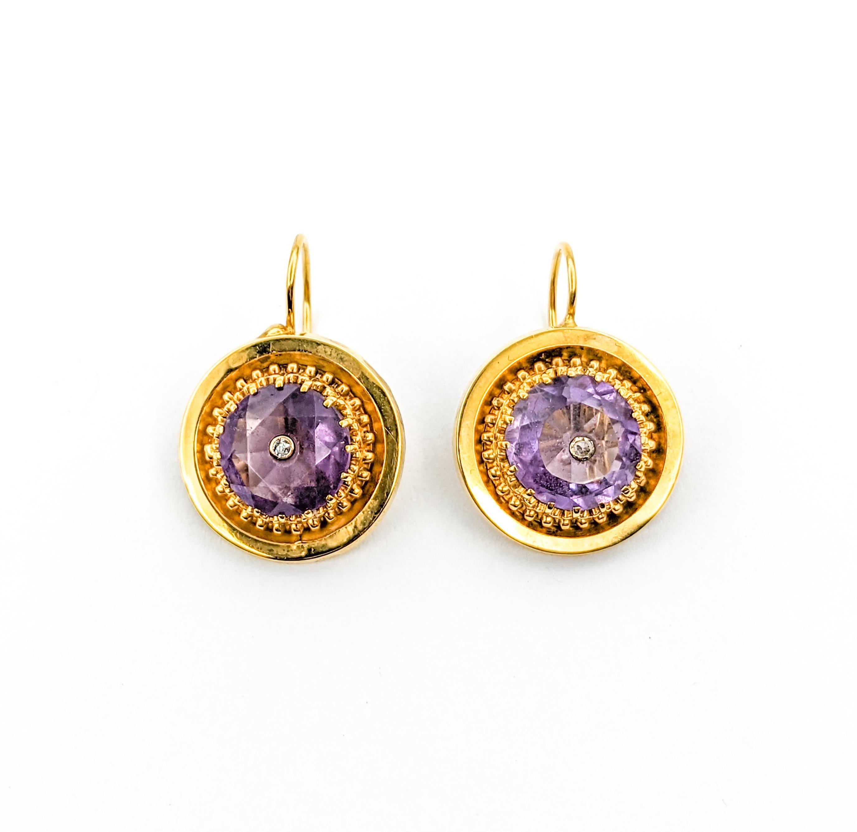 Romantic Diamond & Amethyst Drop Earrings in Yellow Gold

Exquisitely crafted in 14k yellow gold, these antique amethyst earrings are a testament to timeless design. These earrings feature a pair of  10mm faceted amethysts, adding a touch of royal