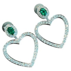 Orecchini in oro 14 carati con smeraldi dello Zambia e diamanti, dal romantico design a forma di cuore