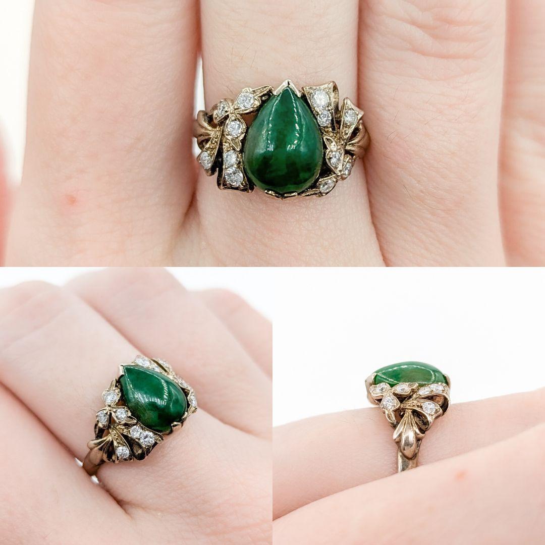 Romantic Jade & Diamond Ribbon Ring in White Gold

This stunning ring is crafted in 14k white gold and features a 0.25 carat total weight (ctw) round diamonds of VS2 clarity and F-G color, offering a brilliant sparkle. The centerpiece of the ring is