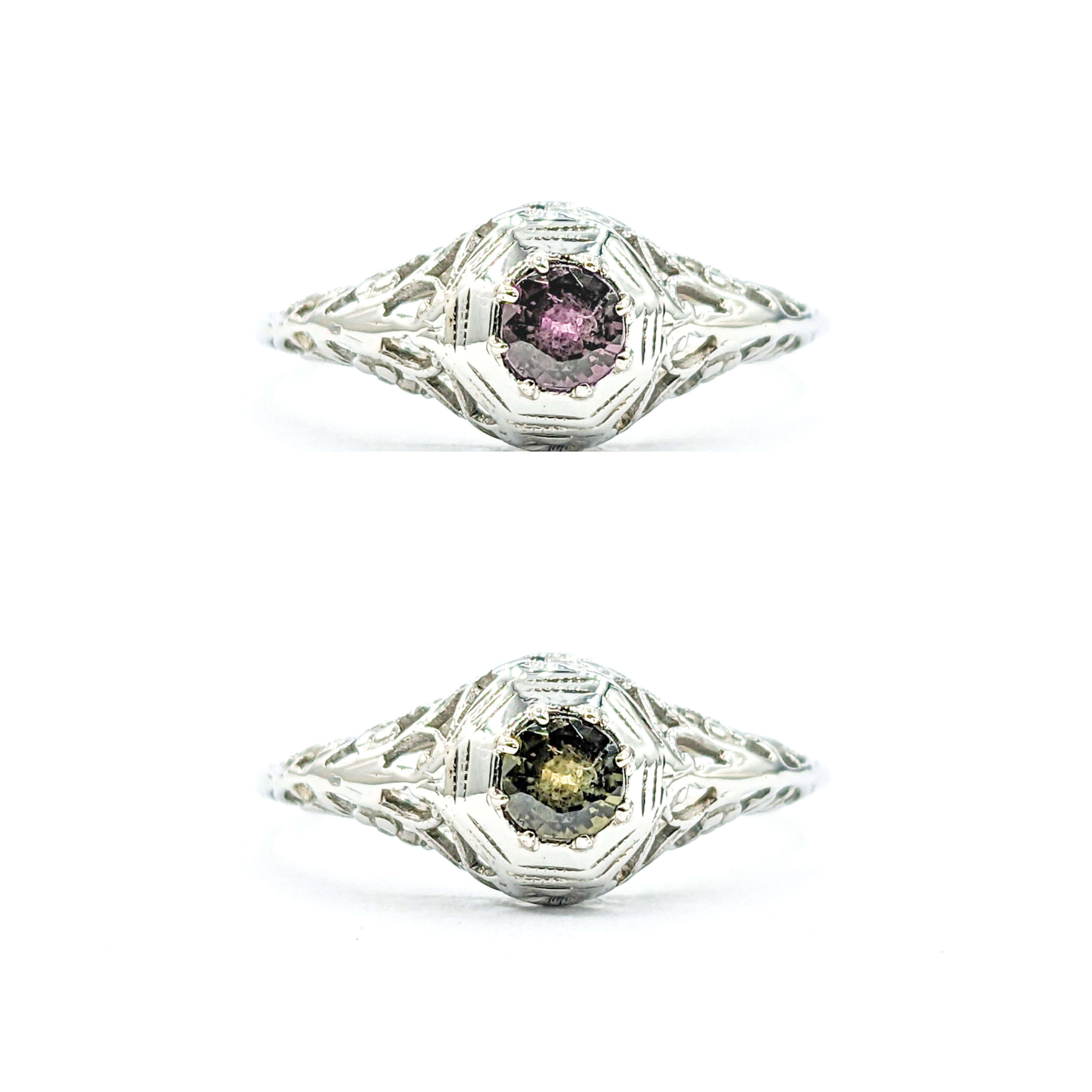 Romantic Natural Alexandrite Antique Ring in 18k White Gold 

Presenting this beautiful ring, a treasure of craftsmanship in 18k white gold. It is adorned with an .28ct round natural Alexandrite, a gemstone celebrated for its enchanting