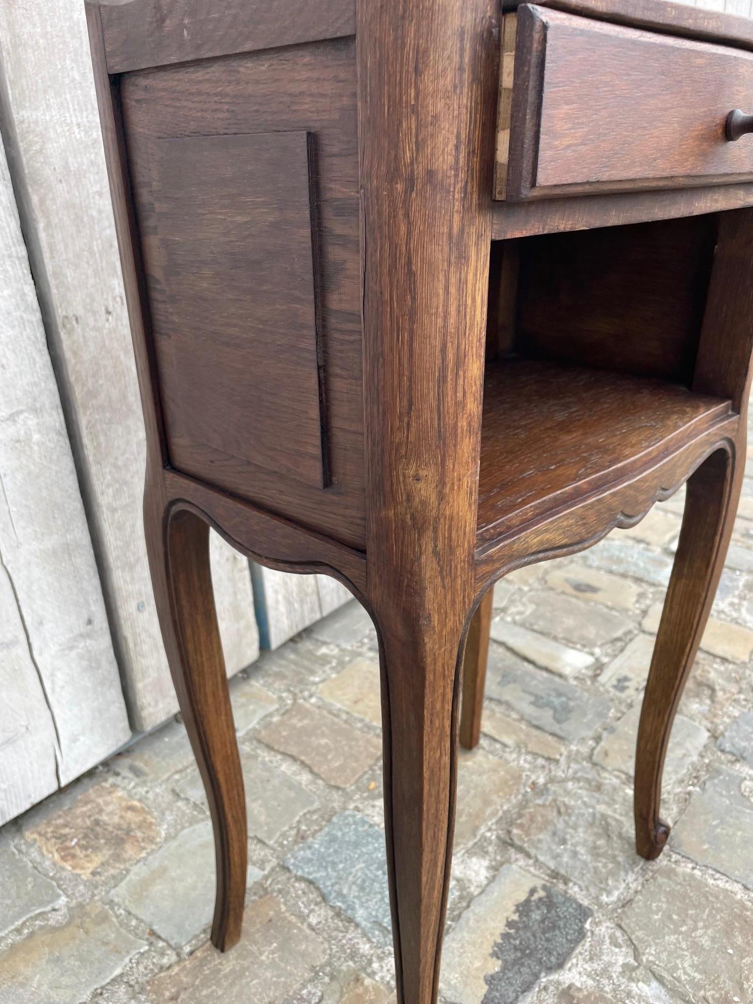 European Romantic oak bedside table in the Louis XV style For Sale