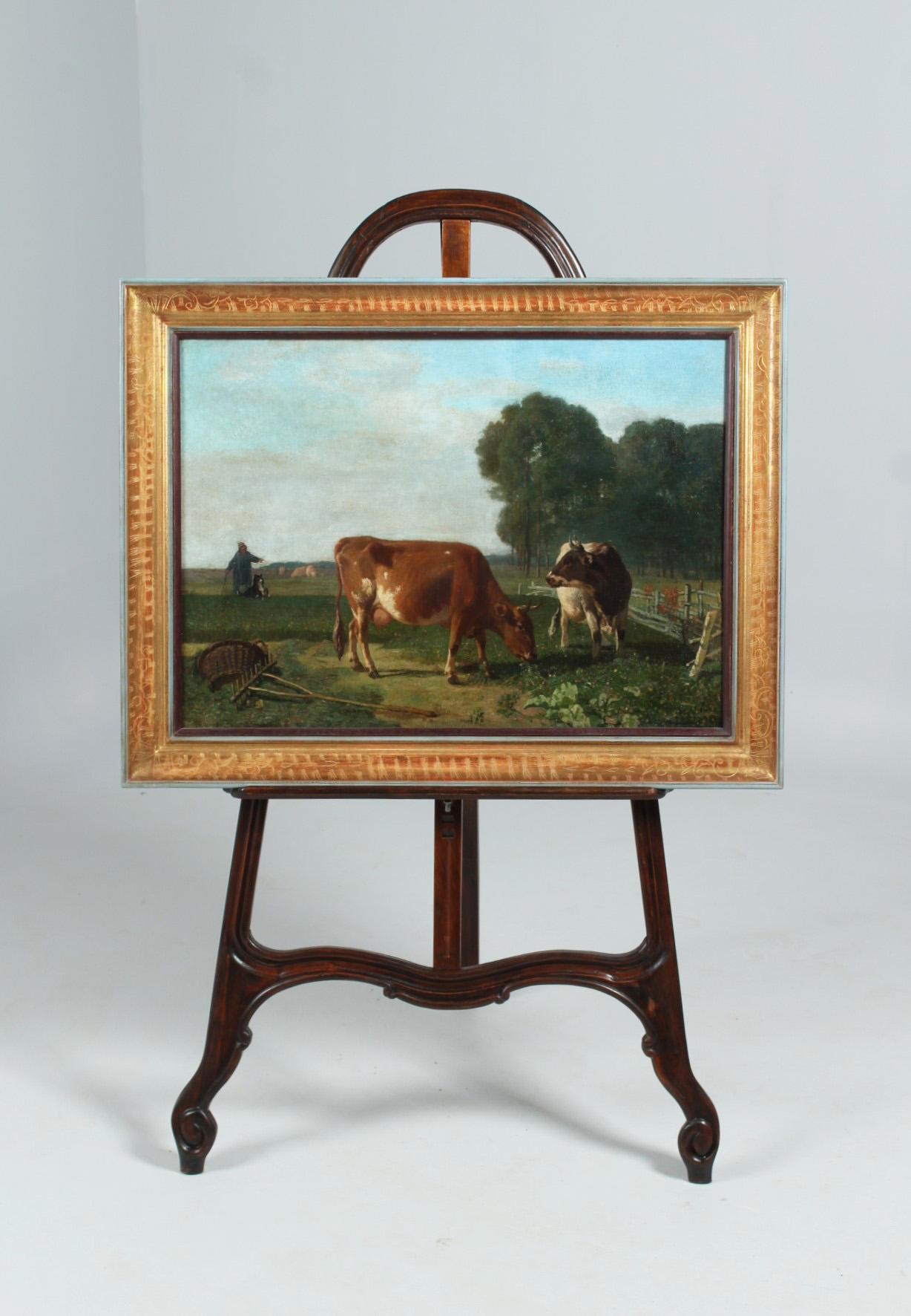 Antique romantic depiction of animals - oil on canvas.
Painted in Belgium at the end of the 19th century.

In the center we see two grazing cows next to farming equipment and in further distance a shepherd with herding dog.
The slightly cloudy