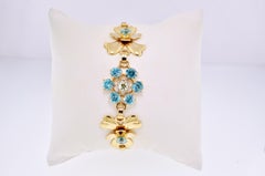Romantisches Vintage-Blumenarmband aus 14 Karat Gelbgold mit Diamant und blauem Topas