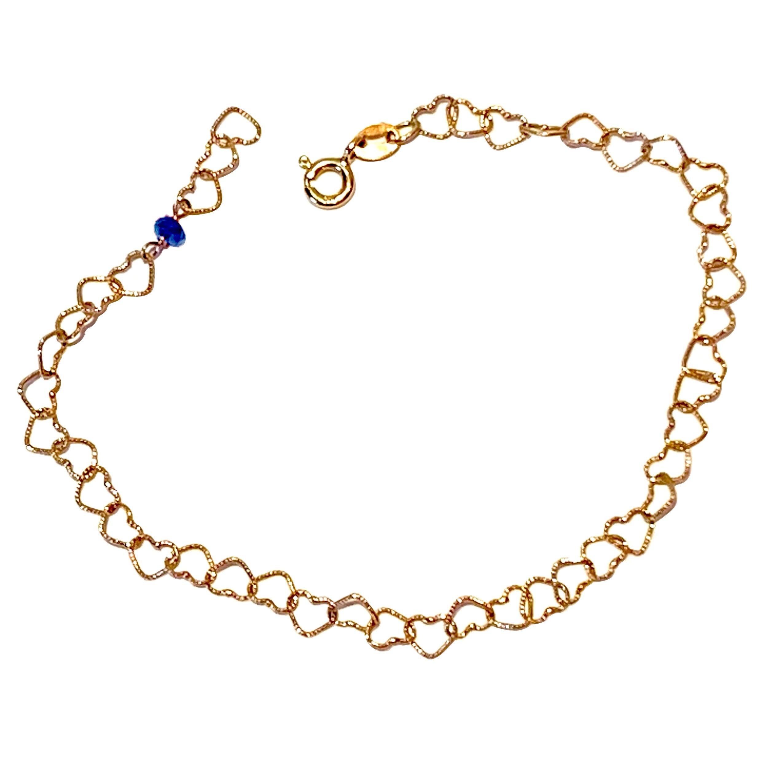 Bracelet unisexe en forme de cœurs en or jaune 18 carats avec saphirs de 0,30 carat, style romantique en vente