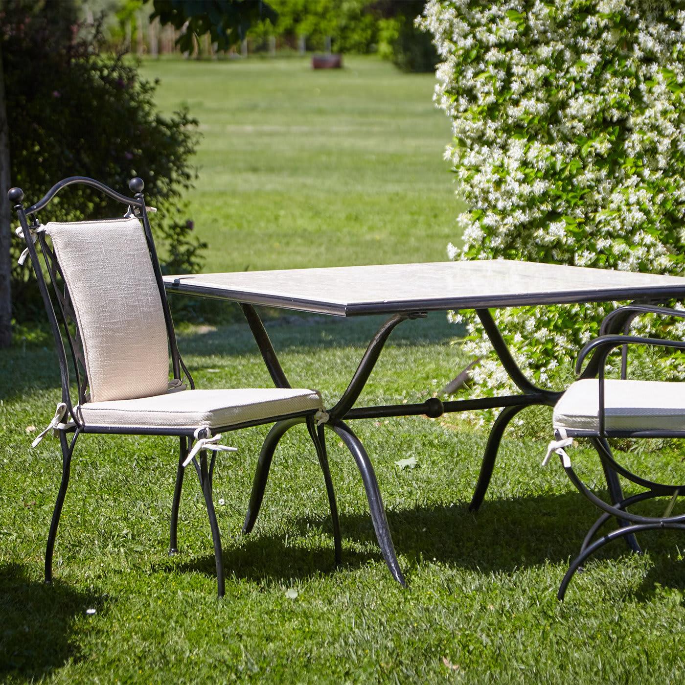 A modern take on a timeless favorite, the Rombo Chair channels traditional Parson flair and combines it with a galvanized, powder-coated stainless steel design that is perfect both indoors and outdoors. Elegant, comfortable, and durable, this