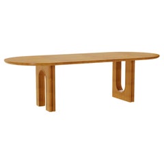 Rome Outdoor Oval Dining Table in Iroko Wood with Sculptural Arched Base