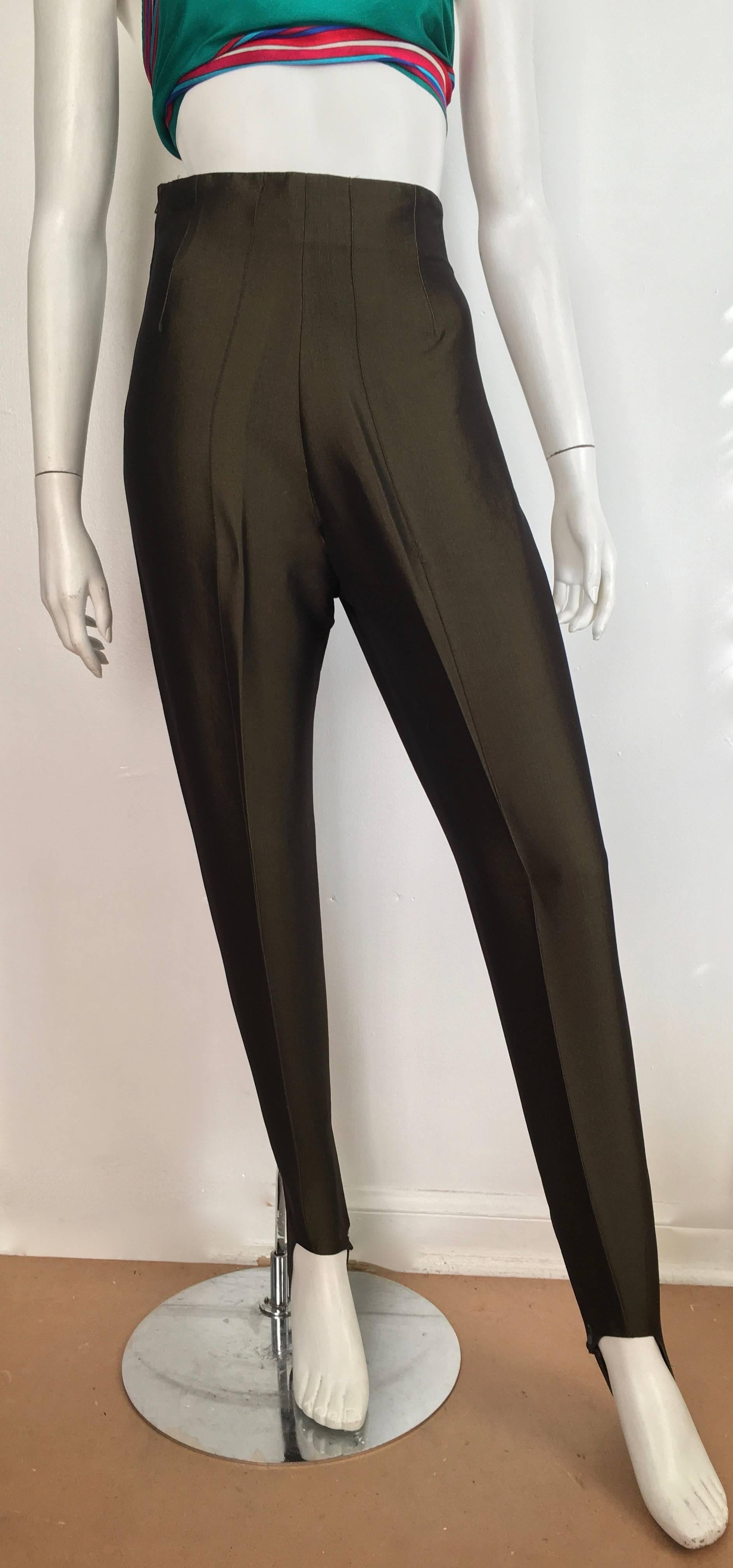 Romeo Gigli 1980s metallic sharkskin stretchy stir up pants are an Italian size 42 and will fit a size 4.  The waist is 27. 1/2