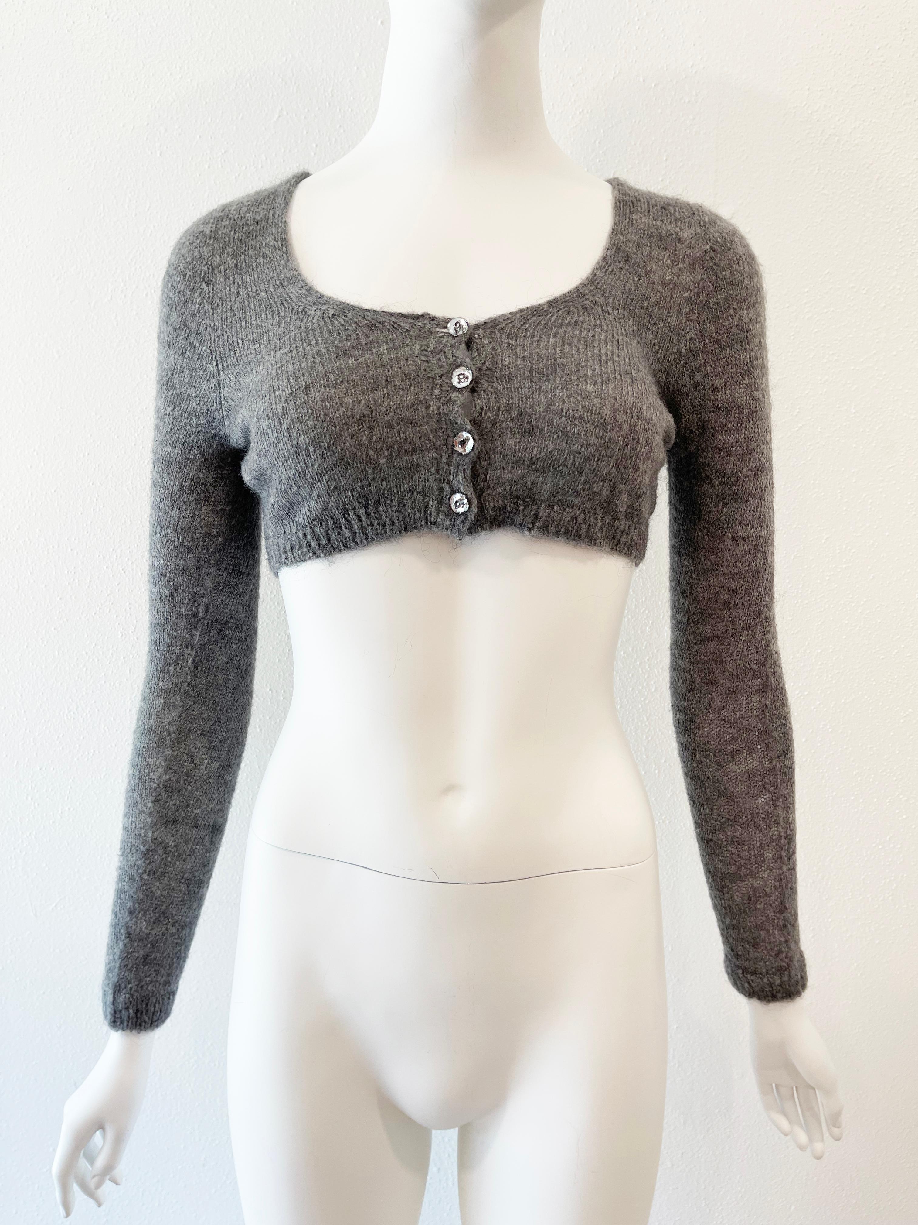 Romeo Gigli cropped sweater 

buttons down front
long sleeve
50% mohair, 50% other
Condition: Excellent
Sz M / L