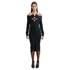 Romeo Gigli A/I 1991: abito in maglia elasticizzata con scollatura a strappo e cut-out
