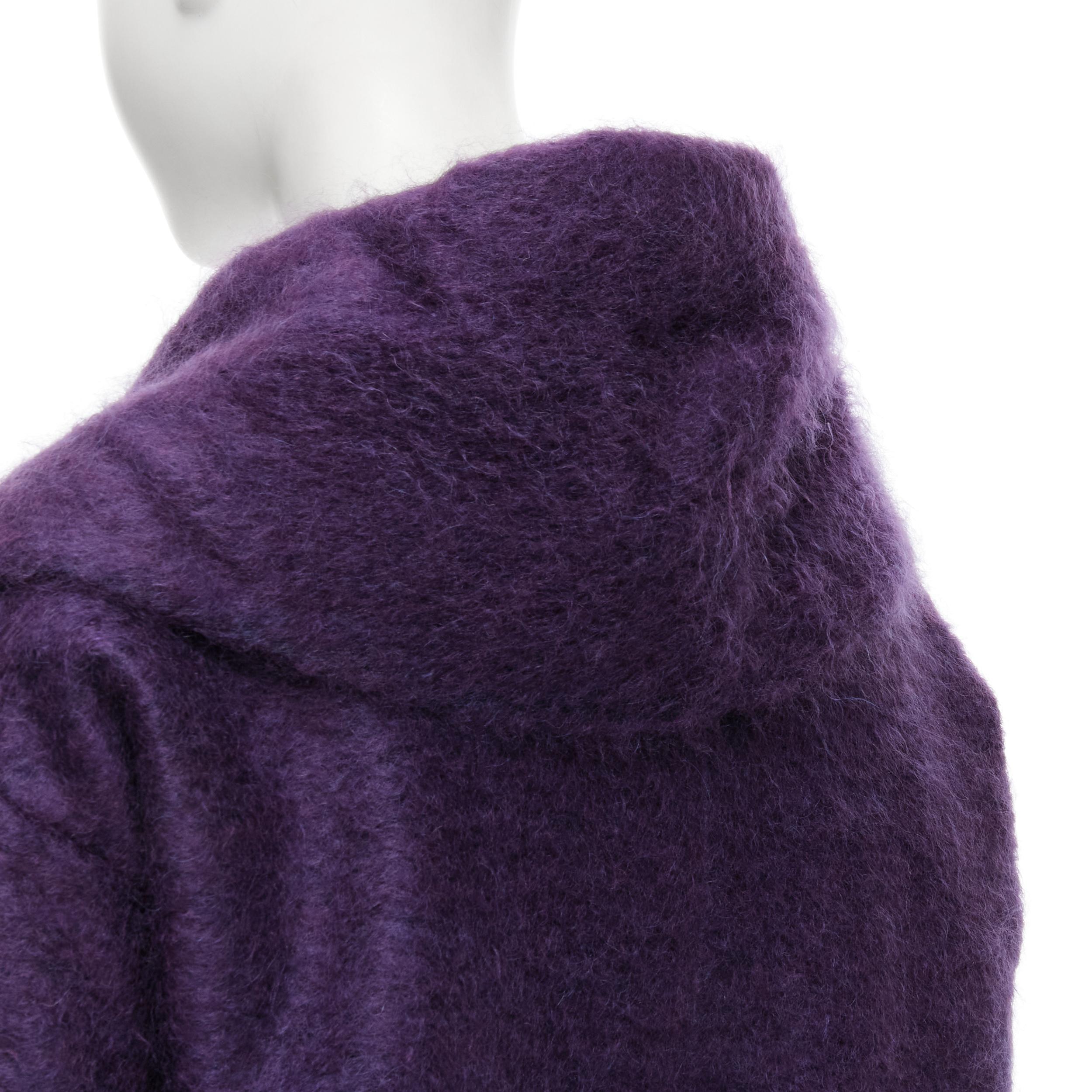 ROMEO GIGLI JOYCE purple fuzzy wool blend double berasted cocoon coat FR36 S Reference: CELG/A00054 
Brand: Romeo Gigli 
Material: Wool 
Color: Purple 
Pattern: Solid 
Closure: Button 
Extra Detail: Dual slit front pockets. 
Made in: Italy