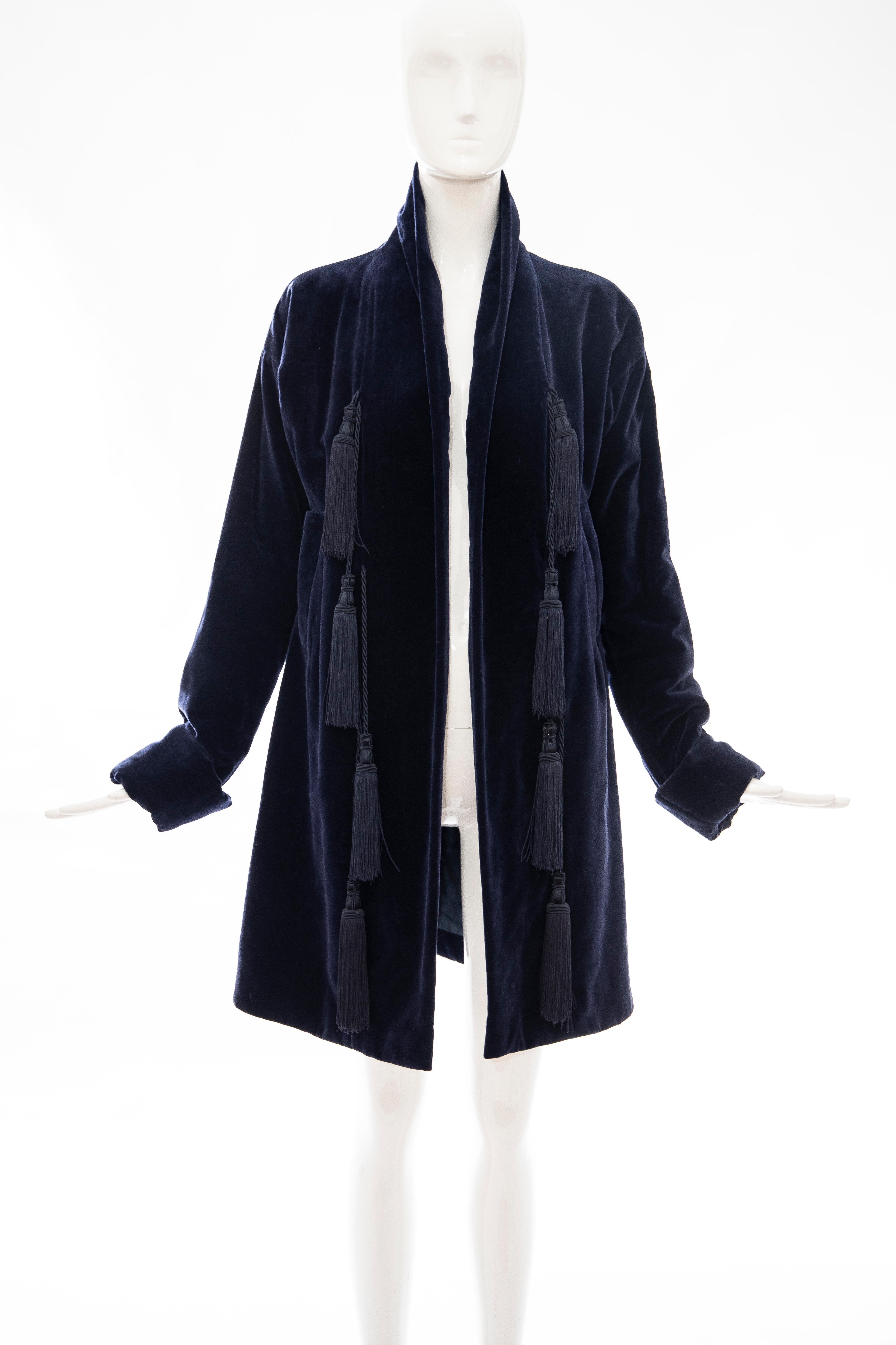 Romeo Gigli, Fall 1994 navy blue cotton velvet Kimono jacket with appliquéd tassels, two front inset pockets, Kimono gusset cuffed sleeve, back vent and fully lined.

FR. 44

Bust: 35, Waist: 33, Hips: 43, Sleeve: 24, Shoulder: 21, Length: 36