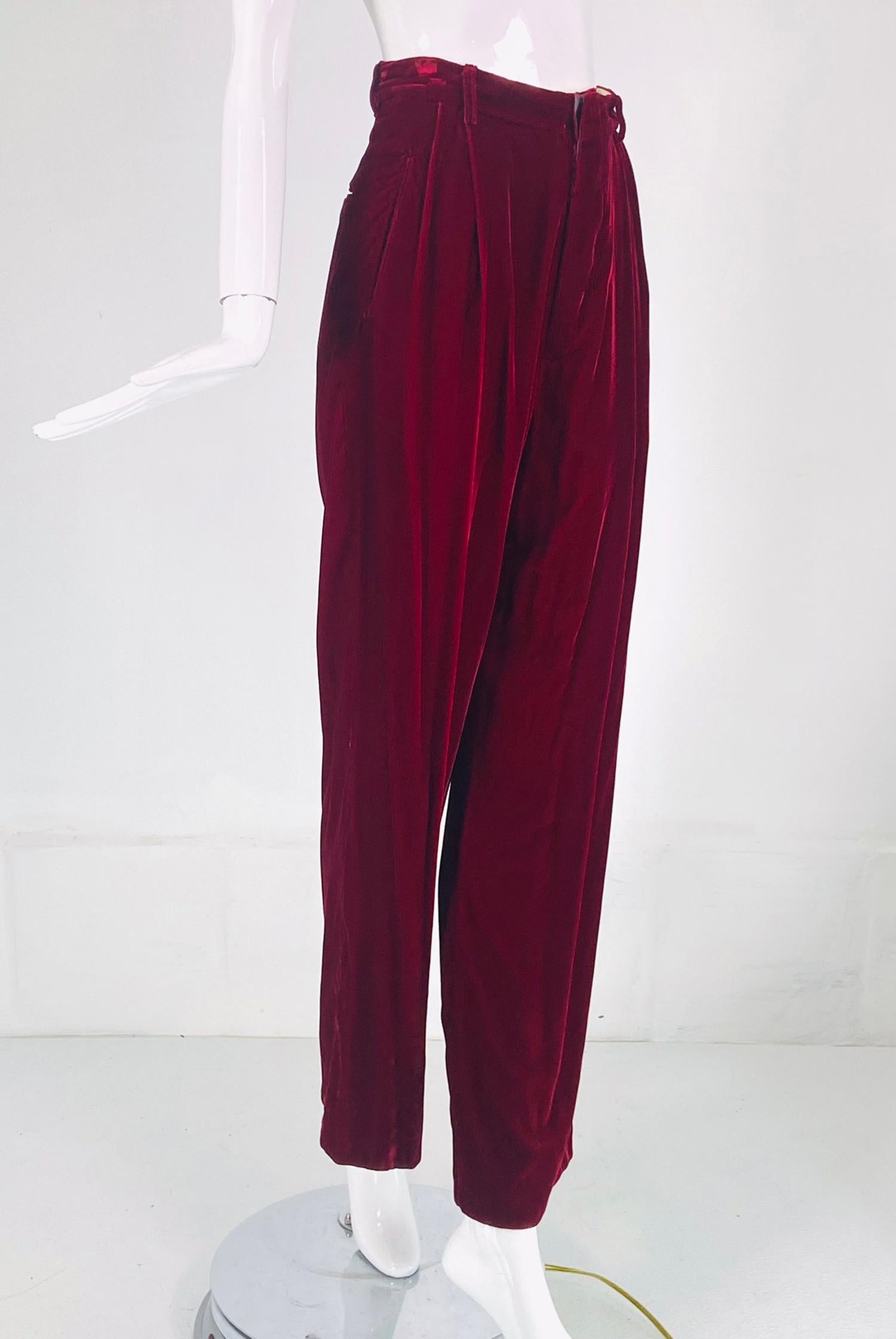 Romeo Gigli S/S 1990 Look 47 RTW womens garnet velvet, man tailored, button fly trouser 40. Beautiful garnet velvet trouser that sits at the natural waist, with pleat fronts, button fly and angled hip side besom pockets. The legs are full and