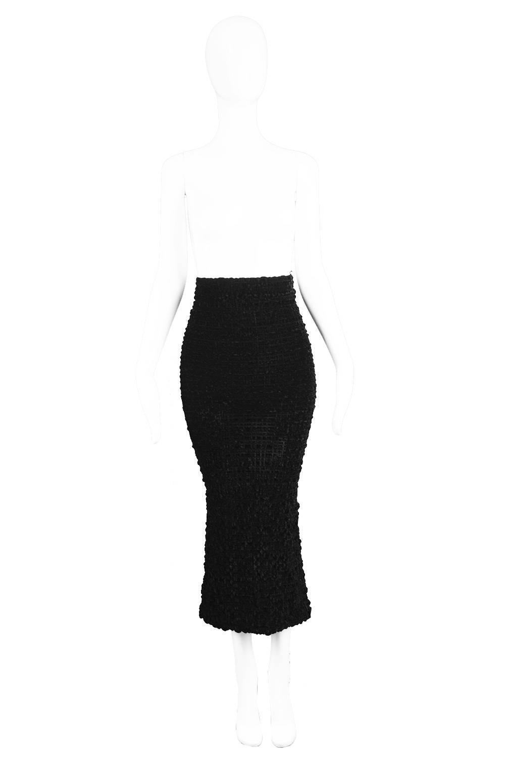 Romeo Gigli Vintage 1980s Black Velvet Textured Smocked Ruched Wiggle Skirt 


Estimated Size: UK 6/ US 2/ EU 34. Please check measurements.
Waist - 25” / 63cm
Hips - 32” / 81cm (has stretch at hips)
Length (Waist to Hem) - 36” / 91cm

Condition: