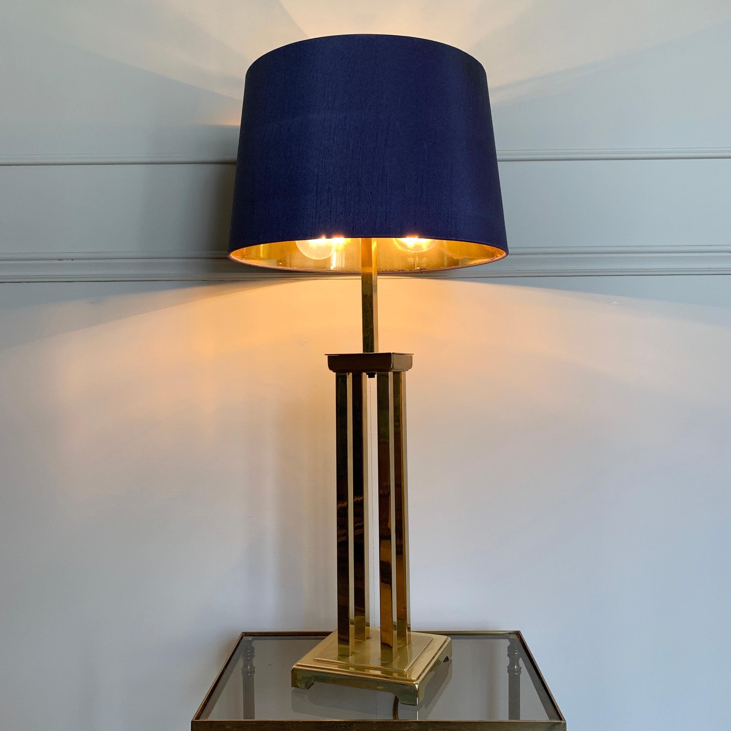 Romeo Rega attributed Cubist brass table lamp, 1970s Italy
A heavy good quality lamp made from solid metal, brass-plated
Replacement modern shade in graphite grey with metallic gold inner (looks more blue in photograph but is grey)
78cm height, base