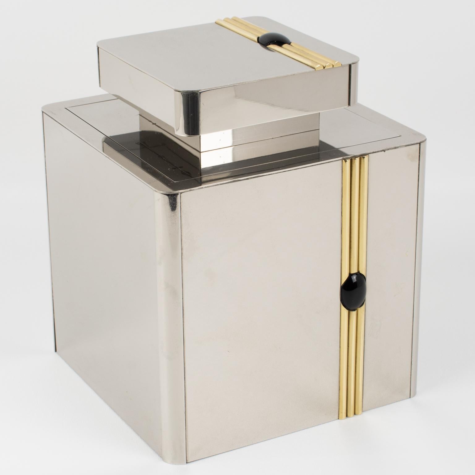 This is a sophisticated barware ice bucket for a bar or cocktail party whose design is attributed to Romeo Rega, Italy, circa 1970. The entertainment accessory features a geometric chrome metal framing ornate with gilded brass striped decor pattern
