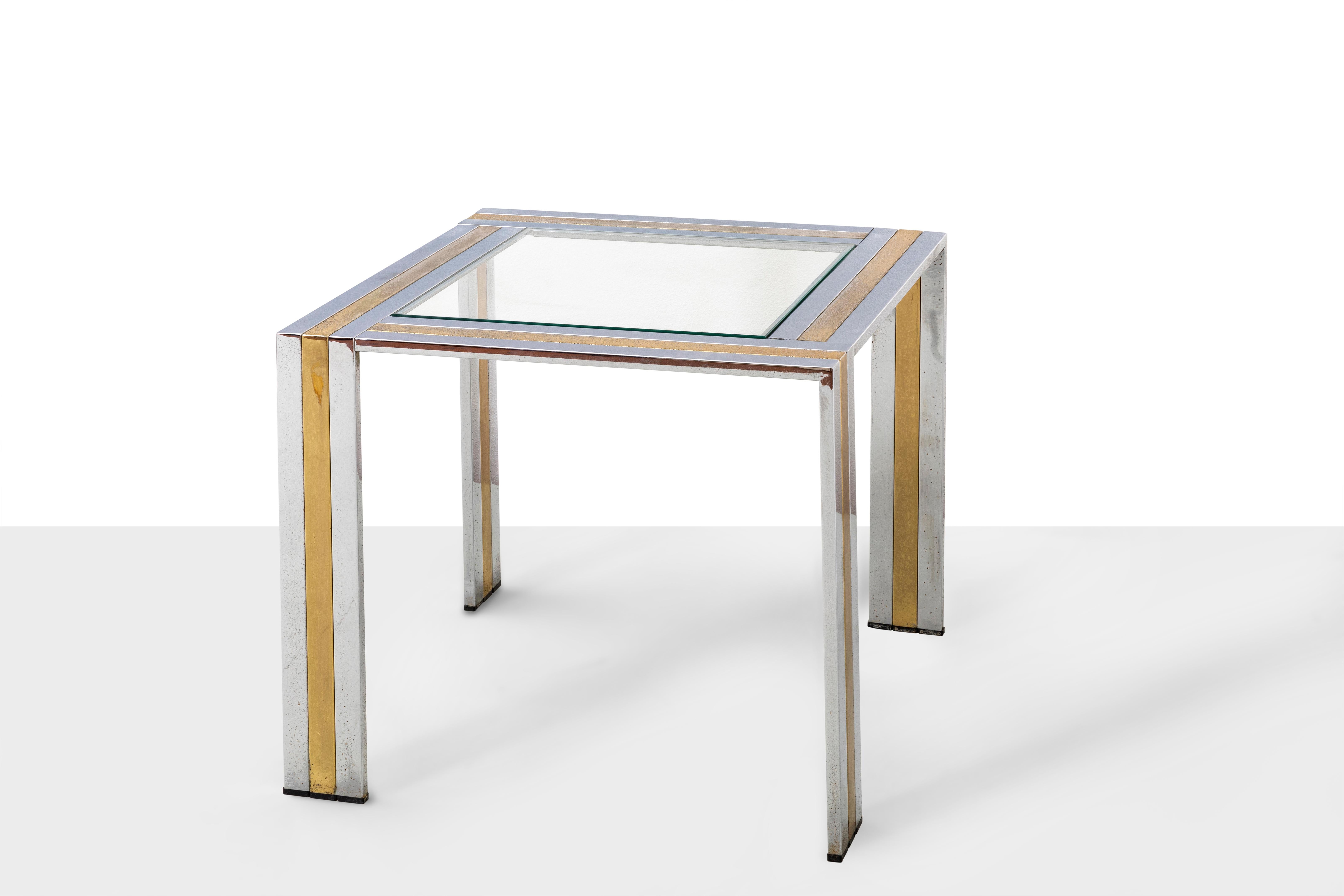 Romeo Rega Prod. Italy, c. 1970 Coffee table in brass and steel with ground glass top. Cm D 60, W 60, H 50 

Romeo Rega is born in Rome on 10 October 1925, third of six children, born and raised in the Trastevere district, in the heart of Rome.
THE