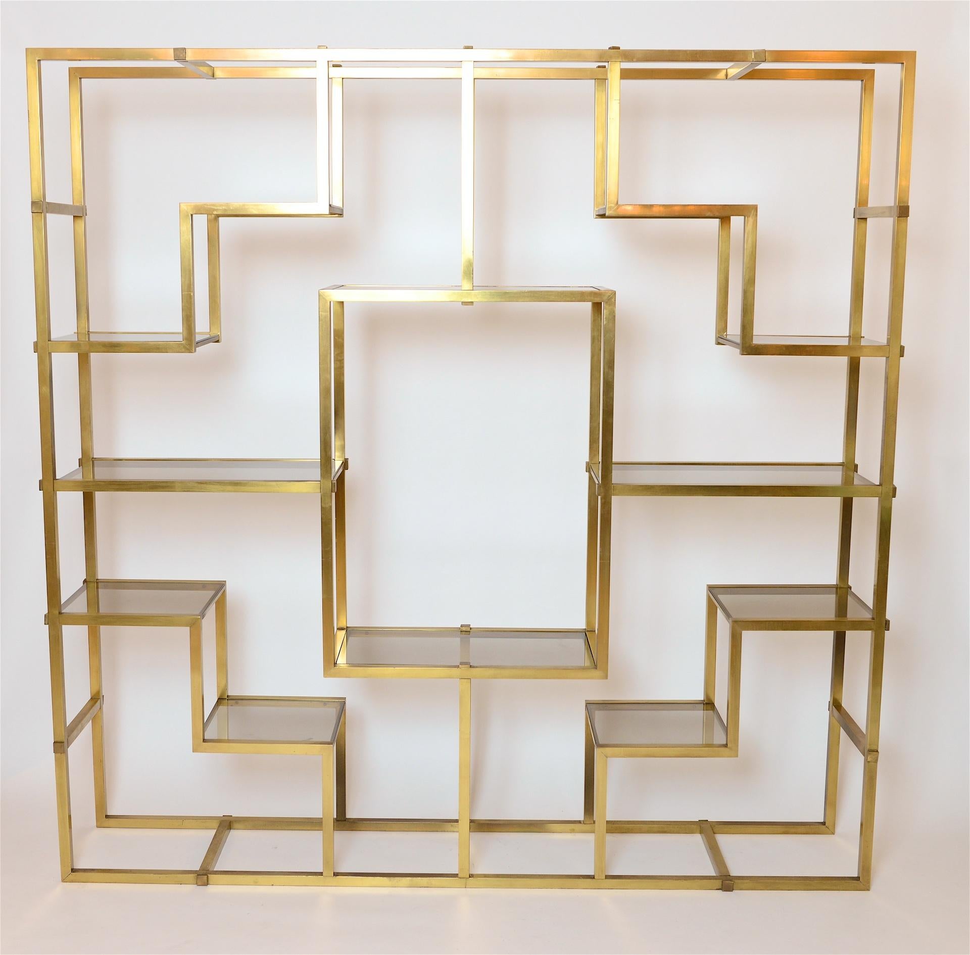 Geometric shelving system designed by Romeo Rega in 1970s Italy.

Lovely patina to brass.

Can be partially dismantled for shipping.

 