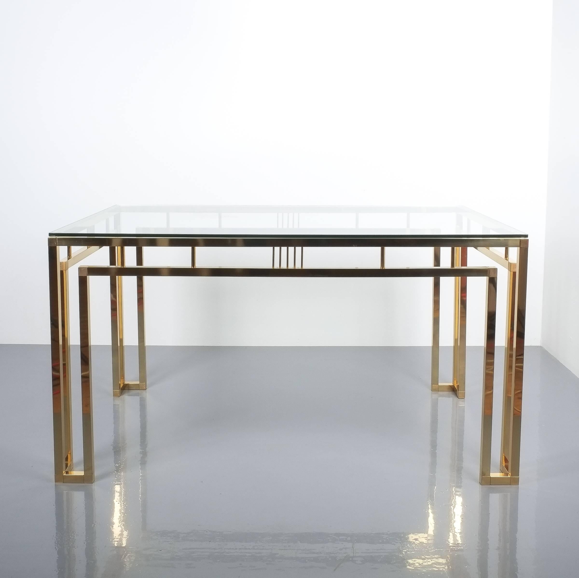 Breakfast or dining table brass glass, Italy, 1960 style of Romeo Rega. Perfectly sized polished brass breakfast table with glass tabletop. It's good for six chairs. Very good condition. The table will be dismantled for shipping. 
 
 