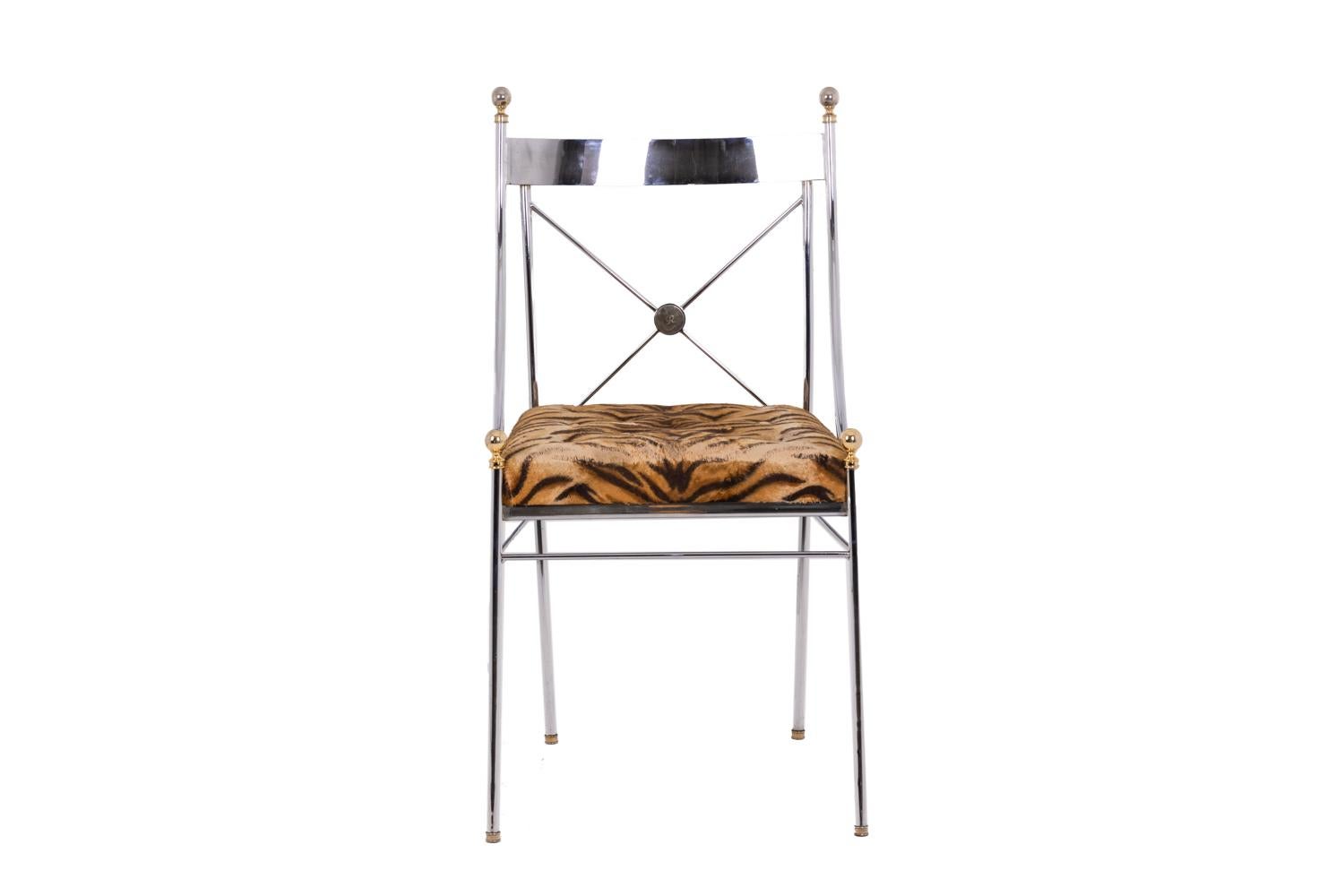 Romeo Rega, signed. 

Chair Directoire style in chromed metal, seat and backrest ending in a decorative ball. Slightly curved top of the backrest. Straight base. Seat upholstered with a printed fabric, tiger motif. Signed in the center of the