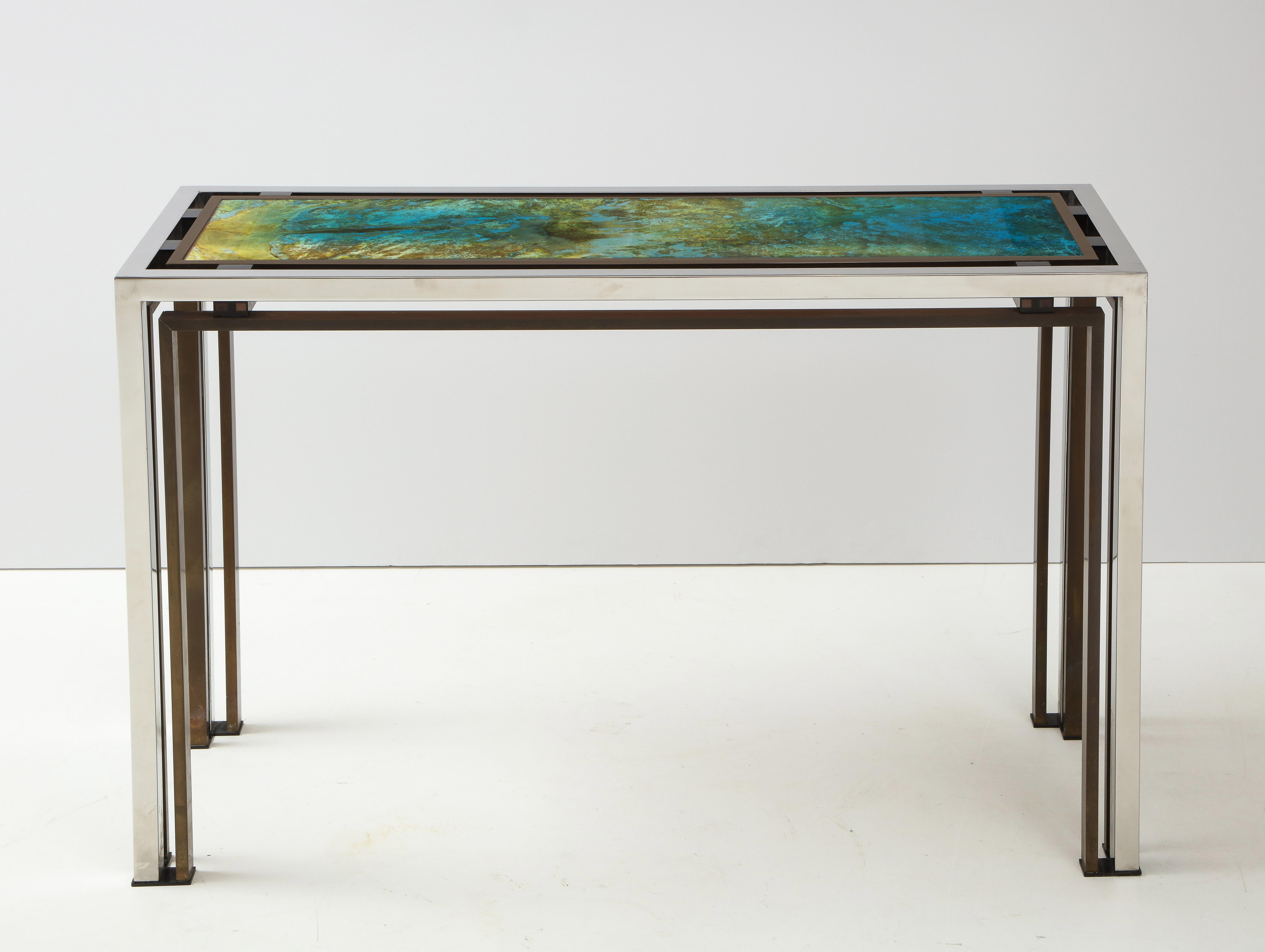 Stunning 1970's chrome and patinated brass with art-glass top console designed by Romeo Rega, in vintage original condition with some wear and patina due to age and use, there is some wear to the brass and chrome.
