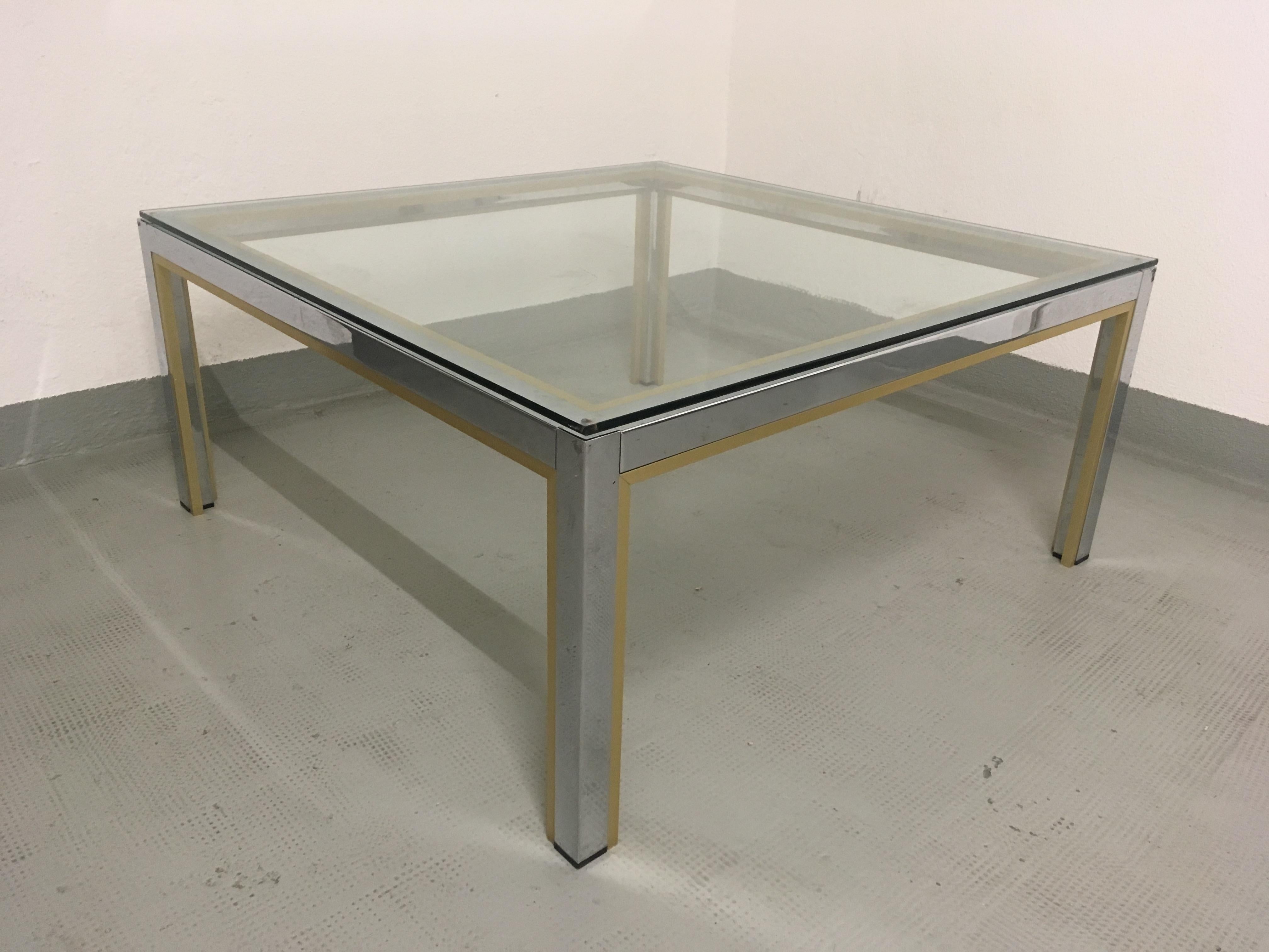 Brass, chrome and glass coffee table by Renato Zevi, Italy, circa 1970s.
 