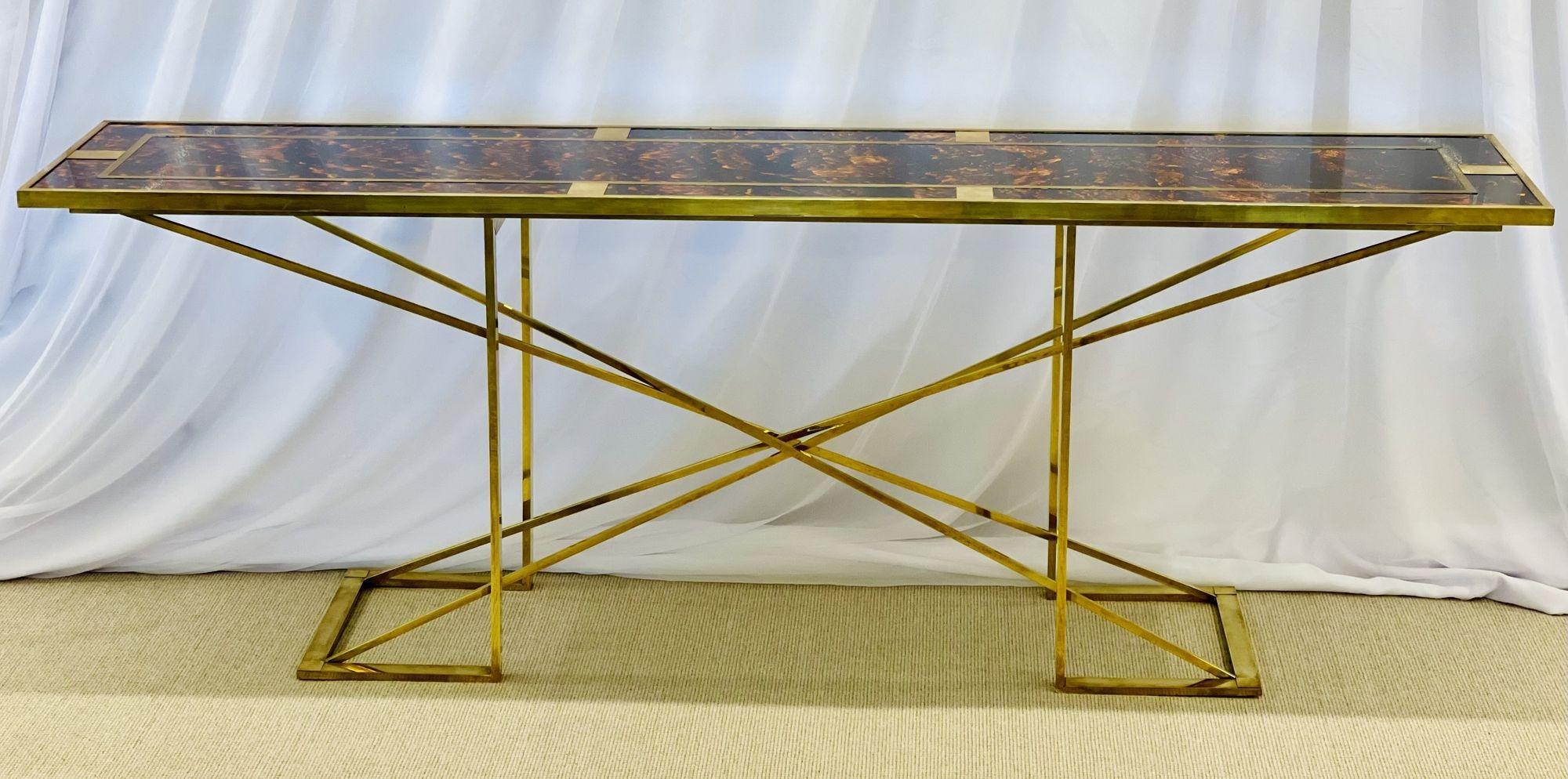 A Modern Romeo Rega console table or sideboard 1970s, faux tortoise top, gilt metal base.
 
The gilt metal exagerated X form geometric base supporting a faux tortoise shell style table top with brass inlays. This stunning piece is possibly the