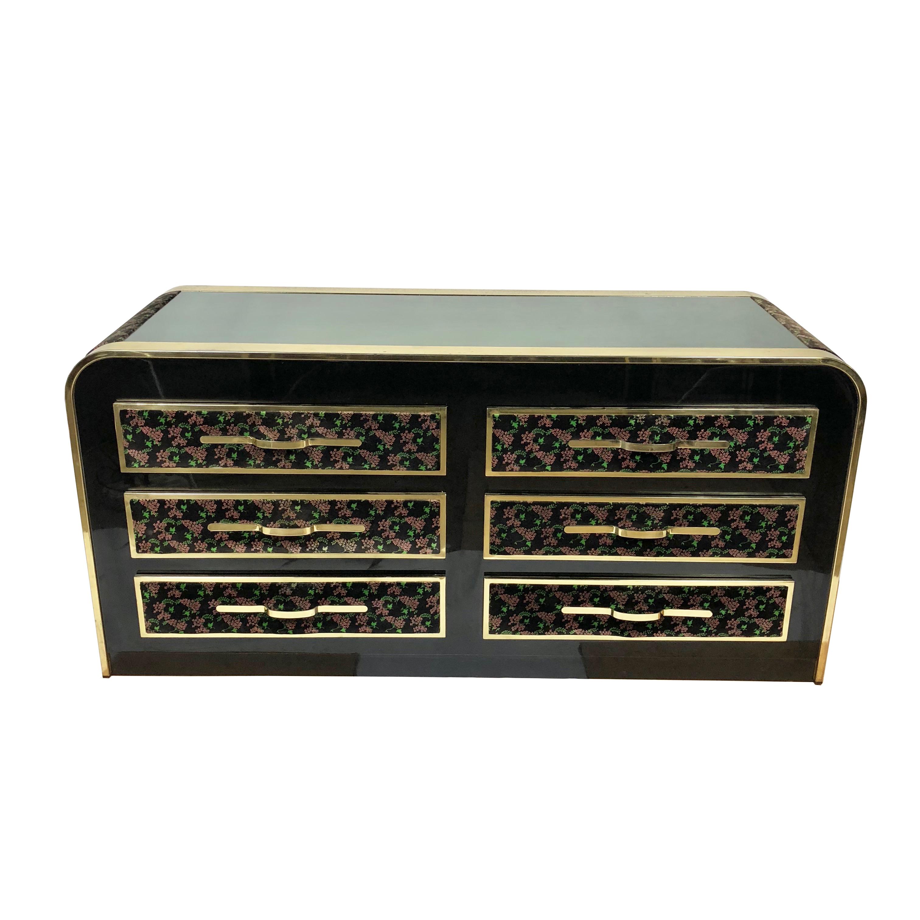 Rare piece of the Italian Romeo Rega dresser in brass and glass (upper part) covered with velvet. The velvet has a floral theme: pink flowers with a green leaf each.