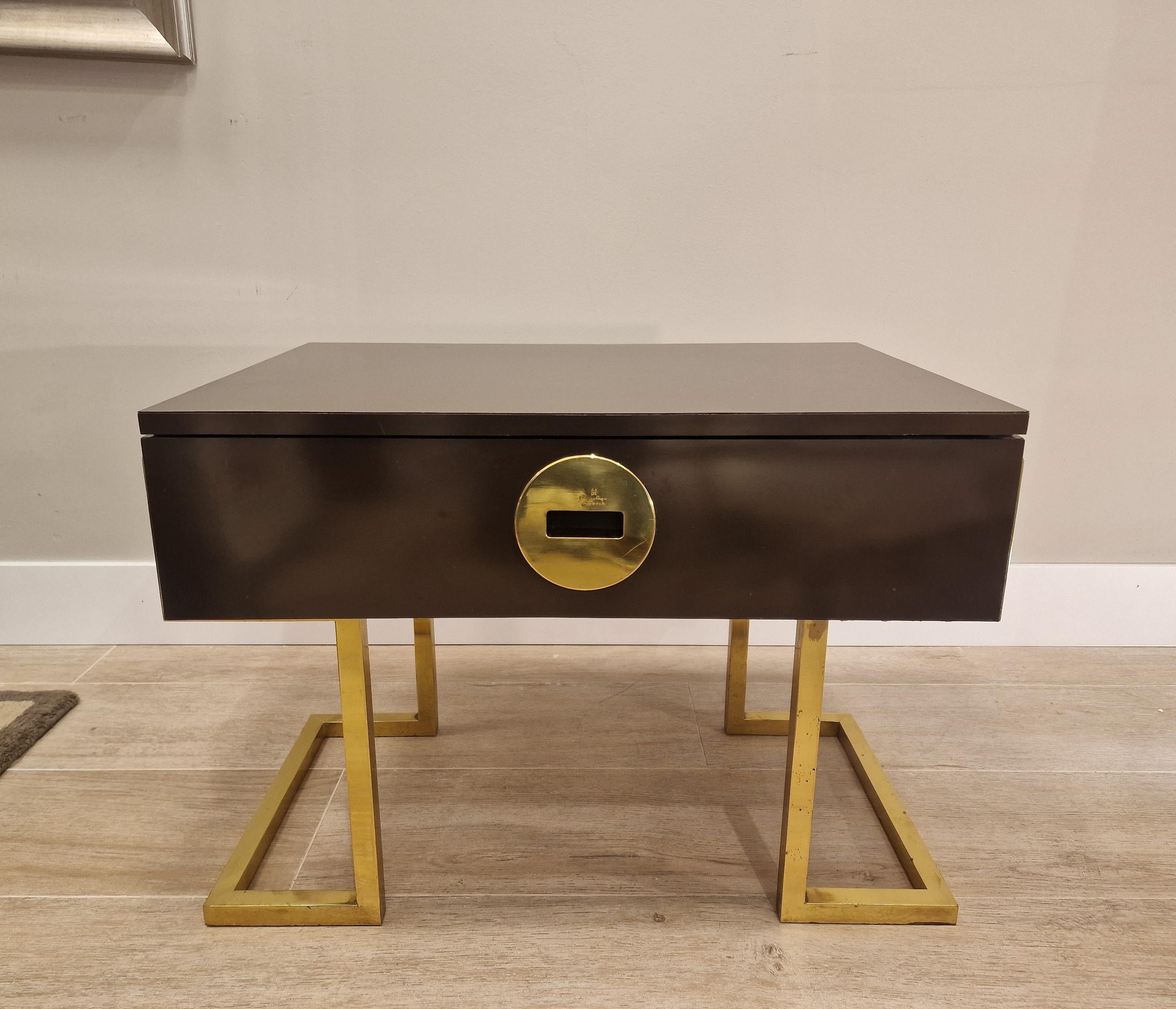 Outstanding , Sophisticated and very  refined side table by the pioneering Italian designer Romeo Rega (1925-1984). Table with drawer and round handle with a hole on which the author has inscribed his signature. Made of light wood lacquered in an