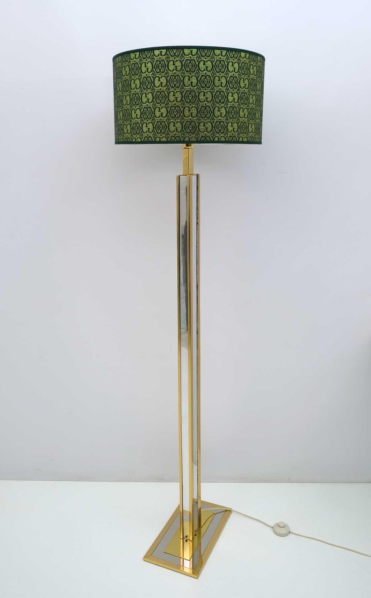 Rare and elegant Romeo Rega floor lamp made of thick brass and chromed metal, with lampshade recently redone with Gucci fabric.