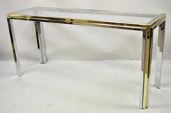 Romeo Rega Tavolo da sala consolle in vetro cromato e ottone in stile Maison Jansen modernista