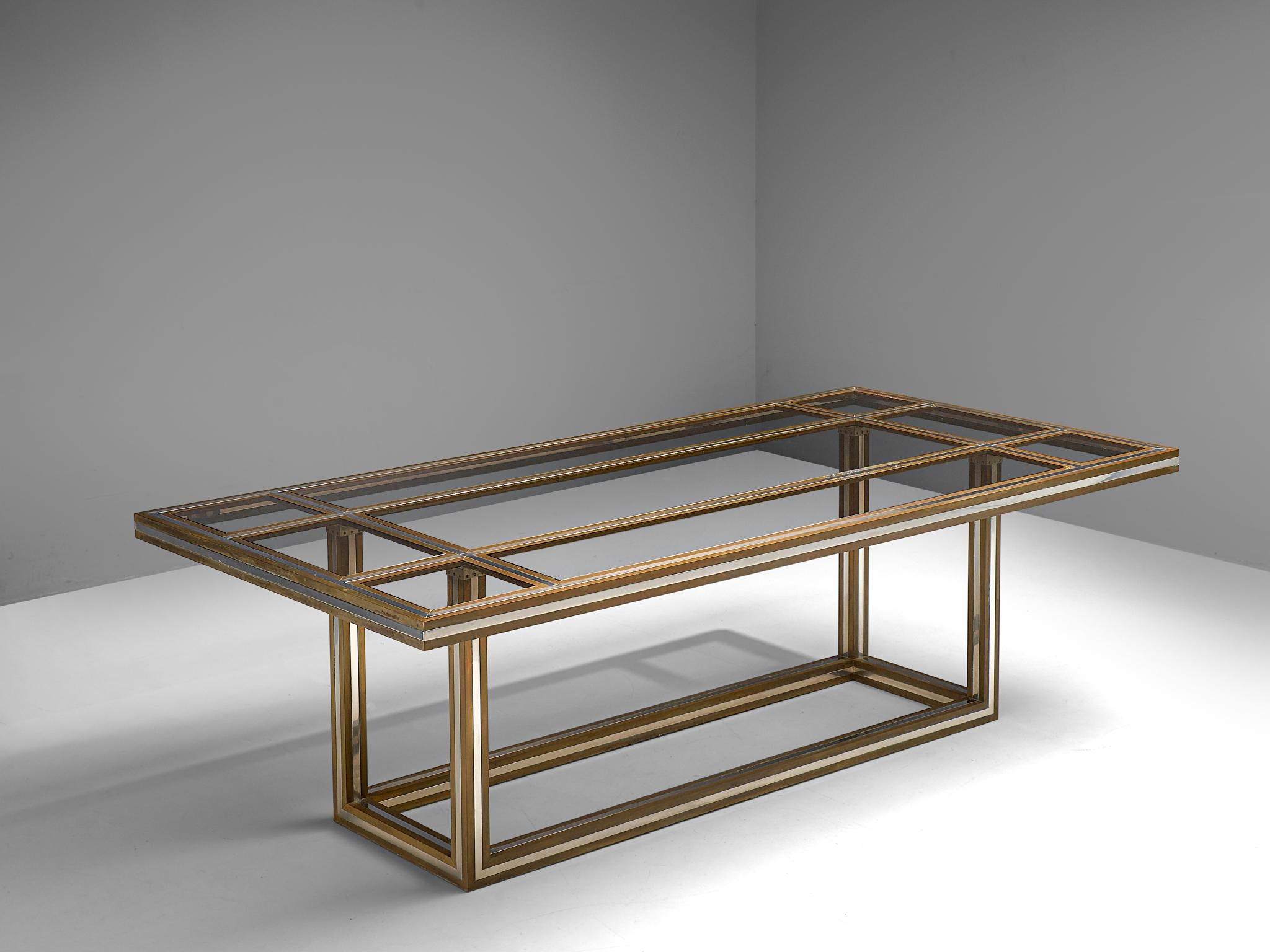 Romeo Rega, dining table, glass, metal and brass, Italy, 1970s

Exquisite brass and metal dining or conference table by Romeo Rega is from the 1970s. The table features a geometric, clean-lined frame. The top is inlayed with smoked glass of