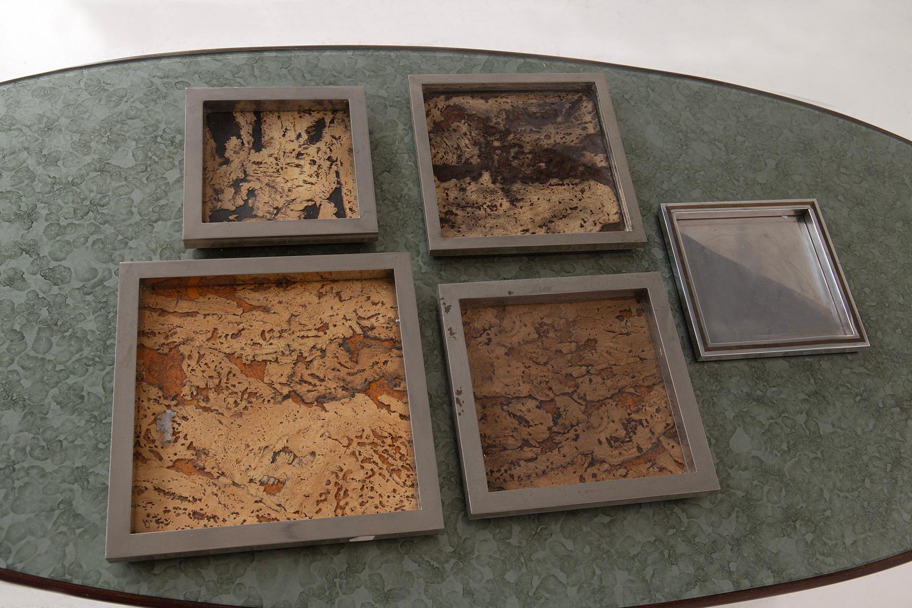 Set of 5 Vintage by Trays by Romeo Rega, 1970s in  metal Chrome, Cork & Glass
Elevate your interior with this exceptional set of 5 decorative trays from the 1970s, attributed to Romeo Rega, one of the most iconic names in Italian mid-century glamour