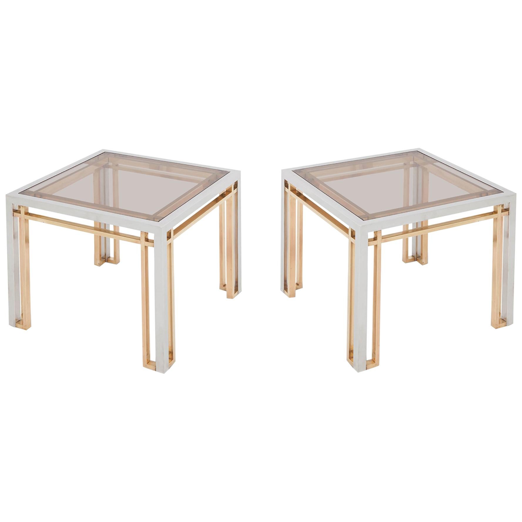 Chrome, brass and smoked glass side tables, Romeo Rega, Italy, 1970s.

A well-known design by the master. A chrome-plated frame, finished with brass details, resulting in a stunning, rich contrast and beautiful lining. Both tops are fitted with