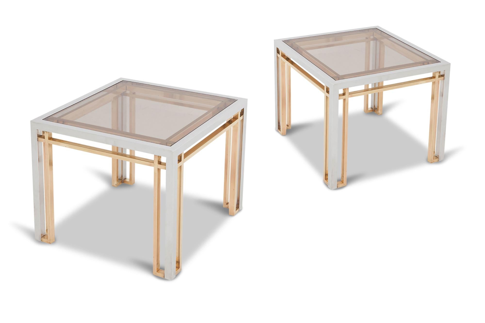 Hollywood Regency square side table’s by Romeo Rega, Italy, 1970s.

A well-known design by the master. A chrome-plated frame, finished with brass details, resulting
in a stunning, rich contrast and beautiful lining. Both tops are fitted with