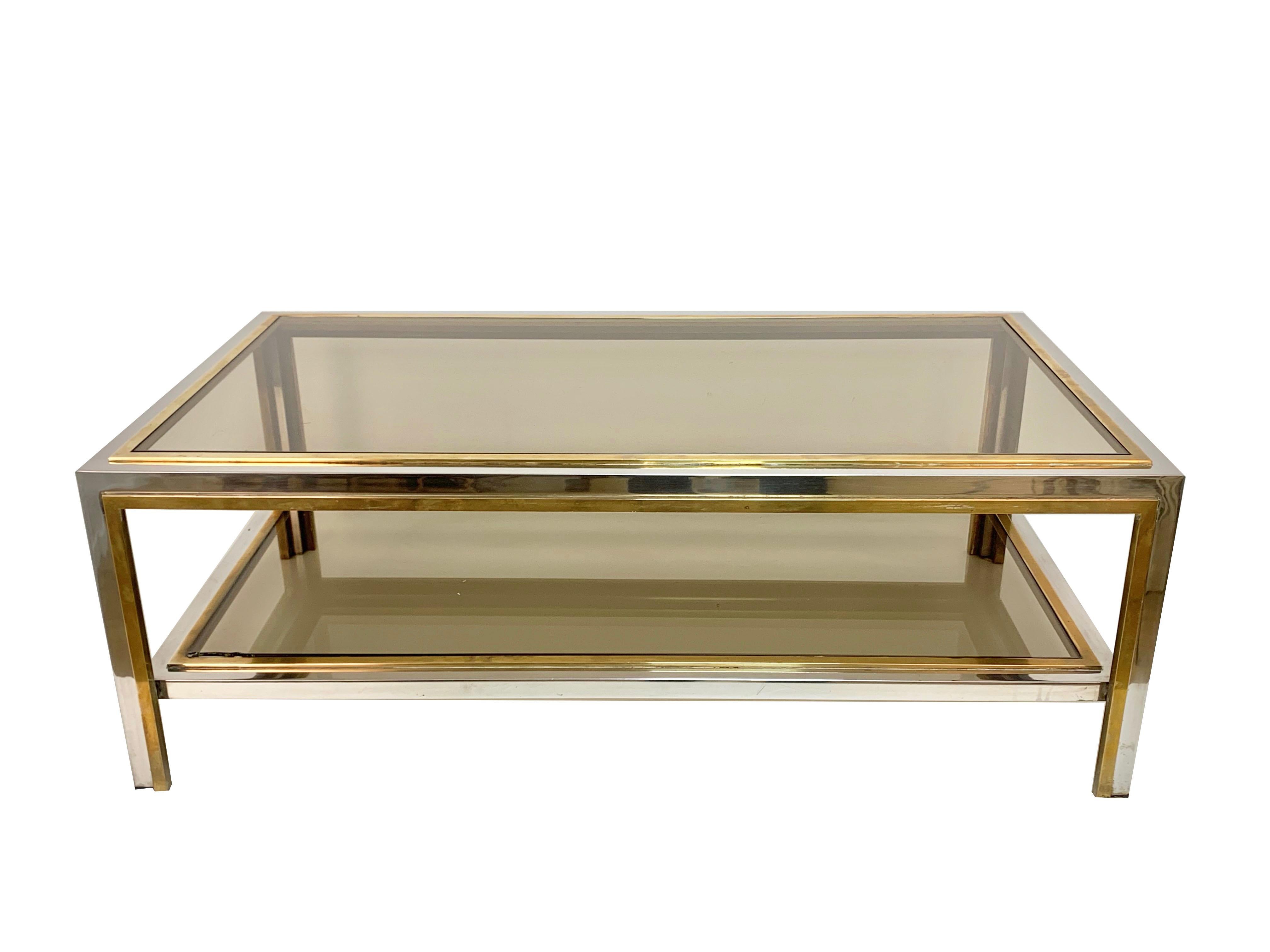 Elegant coffee table in chromed metal and brass, smoked glass adds to the seductive elegance of this midcentury piece.
Two levels
Measurements: 110 x 60 H 40 cm.