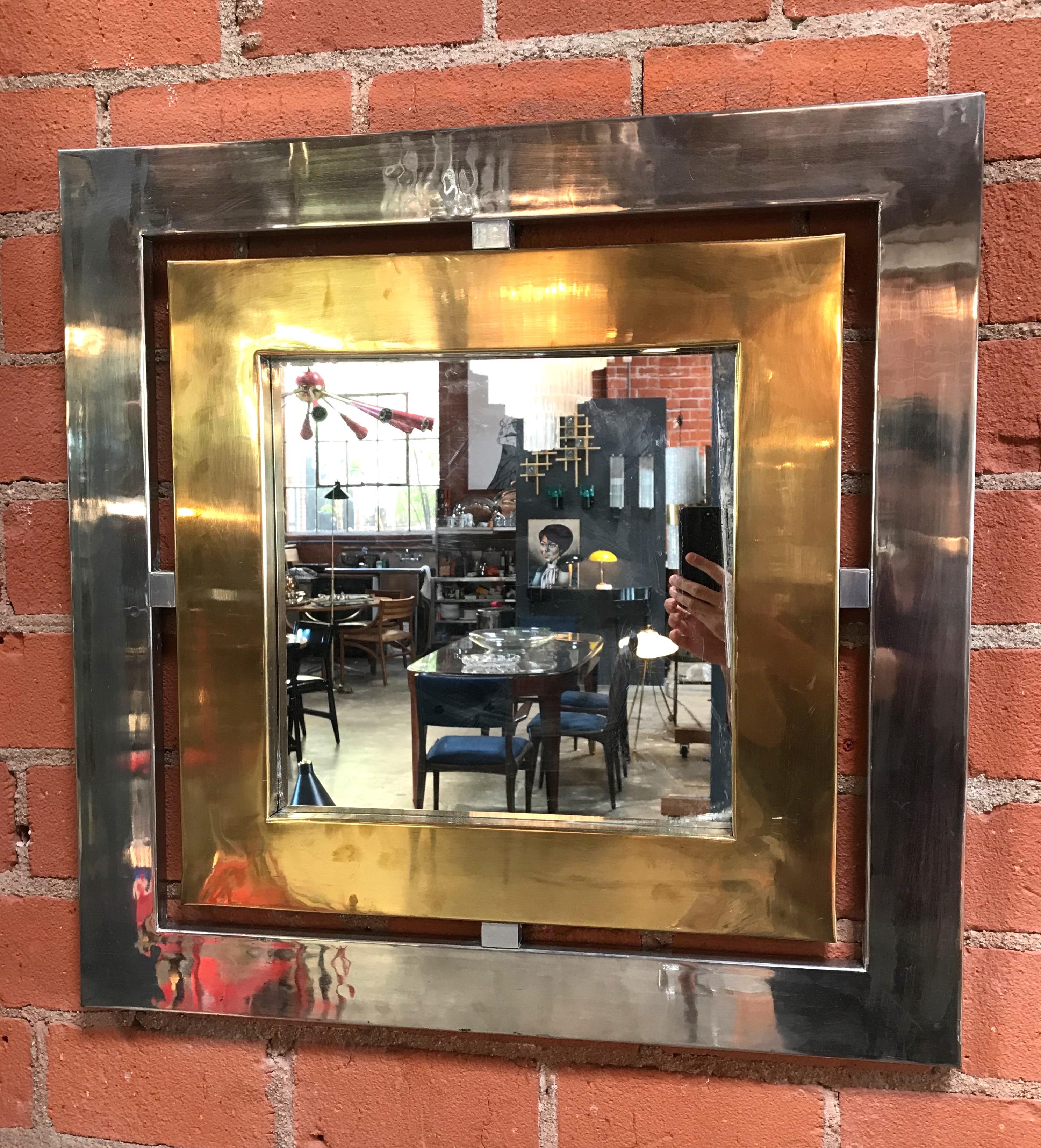 Romeo Rega square wall mirror in brass and steel, Italy, 1970s.
Romeo Rega was part of a pack of Italian designers combining inventiveness and elegance with strong modernist influence in the 1970s.
Working with Willy Rizzo & Gabriella Crespi they