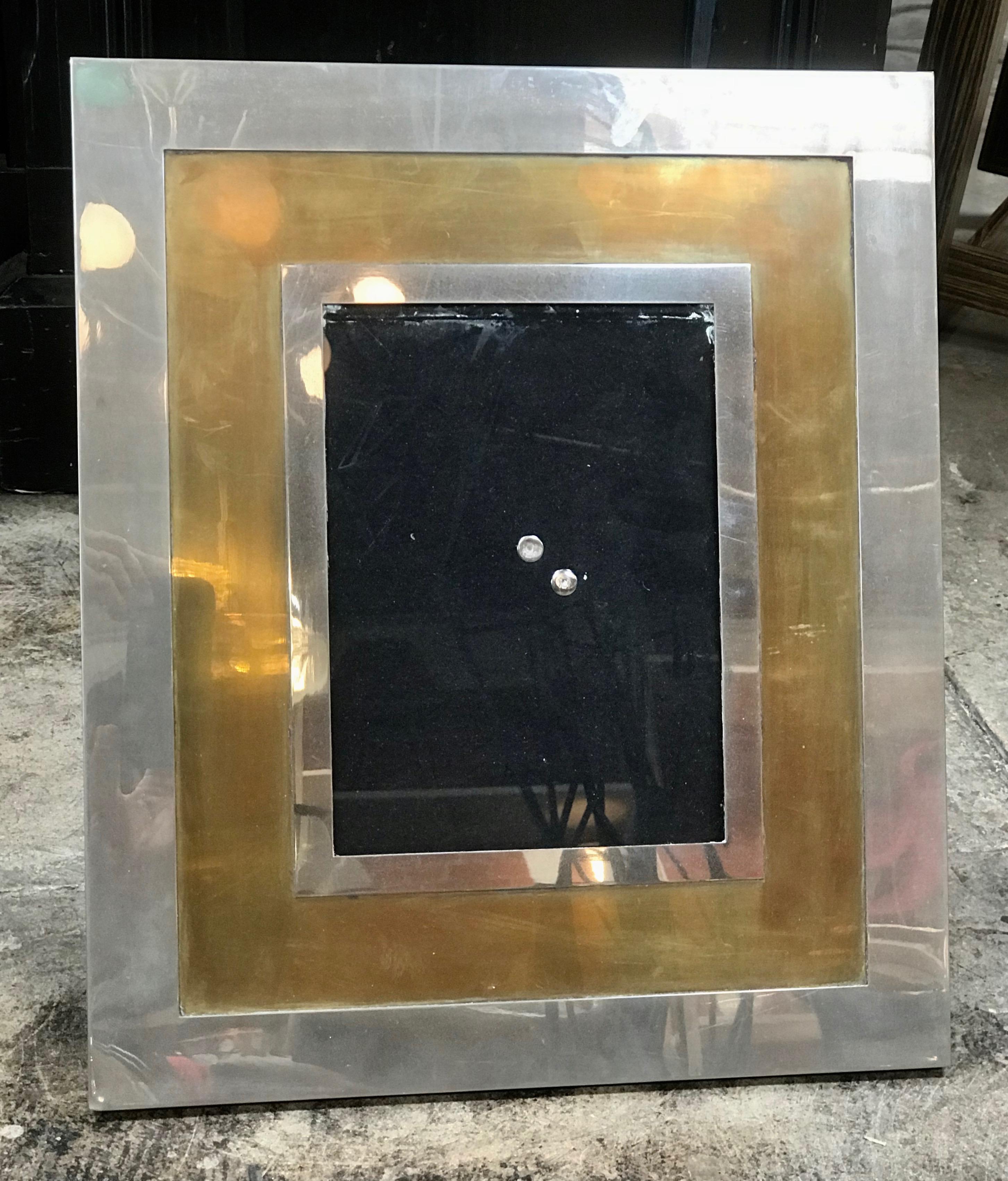 Romeo Rega: Vintage Italian 1970s chrome and brass picture frame. Minor scuffs to chrome and patina to brass. Back in velvet.
 Picture photo frame can be placed in portrait or in landscape position.