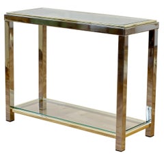 Table console bicolore à deux niveaux et double étagère en chrome et laiton