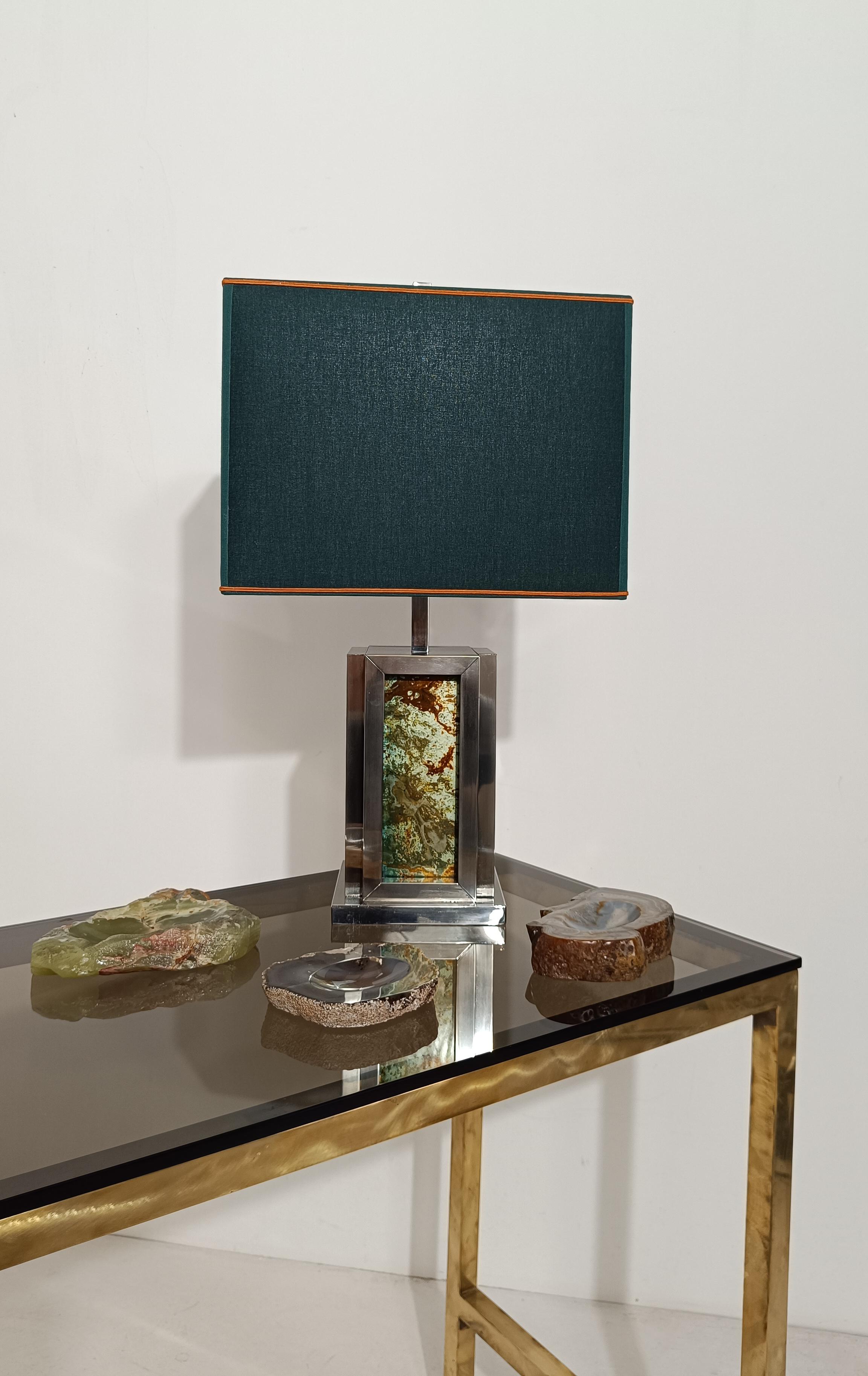 We offer for sale a splendid large table lamp, made in Italy in the 70s by Romeo Rega.
We purchased this vintage lamp in a Roman house together with its twin center table, which you can find in our selection available for sale.
This table lamp fully