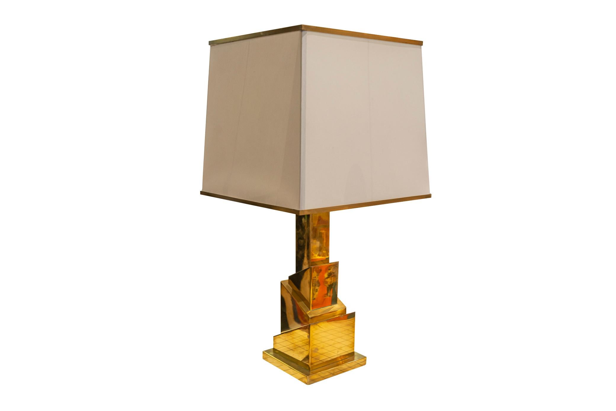 Romeo Rego,
Skyscraper Table Lamp,
Signed at the base,
Italy, circa 1970.

Measures: Height 79 cm, Width 40 cm, Depth 40 cm.

Born in 1904, Italian designer Romeo Rega is one of several 1970s-era designers that are associated with a