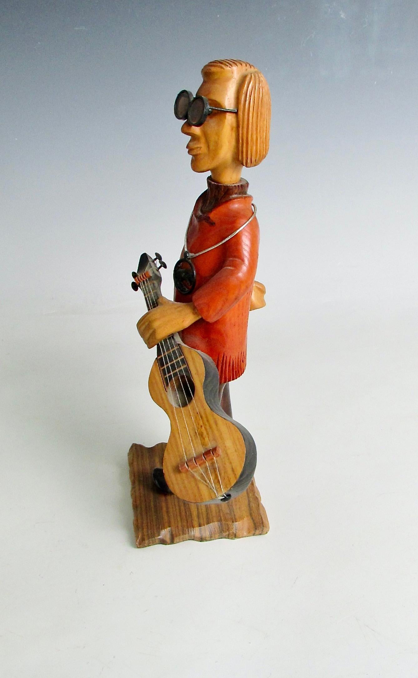 Romer italia escritorio tallado a mano hippie boho folk rock guitarrista escultura Tallado a mano en venta