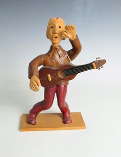 Romer italy hand carved desk top rock and roll guitar player sculpture