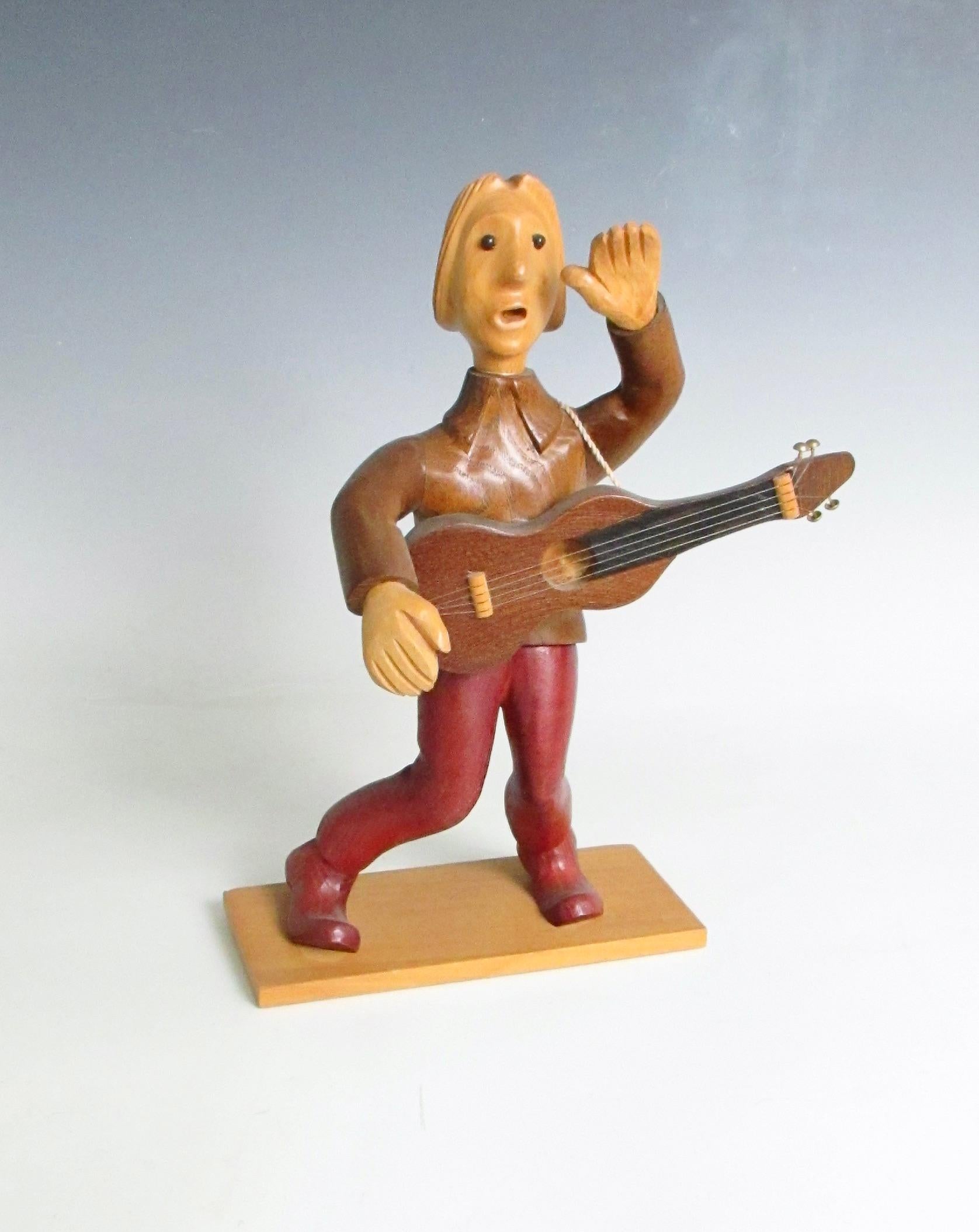 Romer escultura de guitarrista de rock and roll de sobremesa tallada a mano en Italia Madera en venta