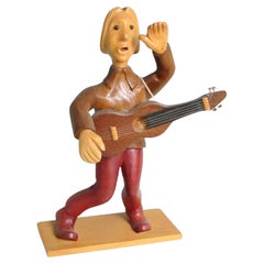 Romer italy hand carved desk top rock and roll guitar player sculpture